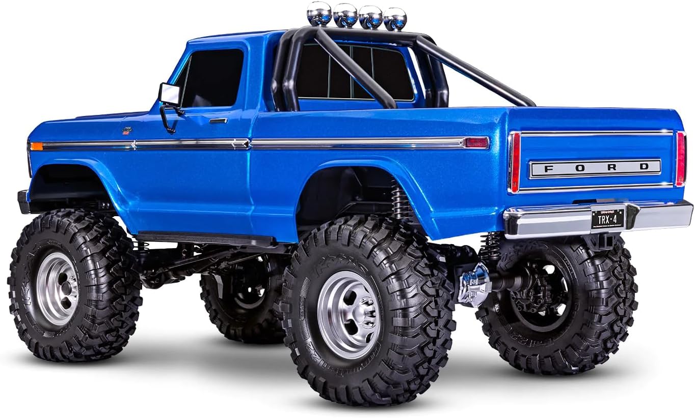 ጎን view of the Traxxas TRX-4 1979 Ford F-150 High Trail Edition RC truck, showing its elevated chassis and large wheels.