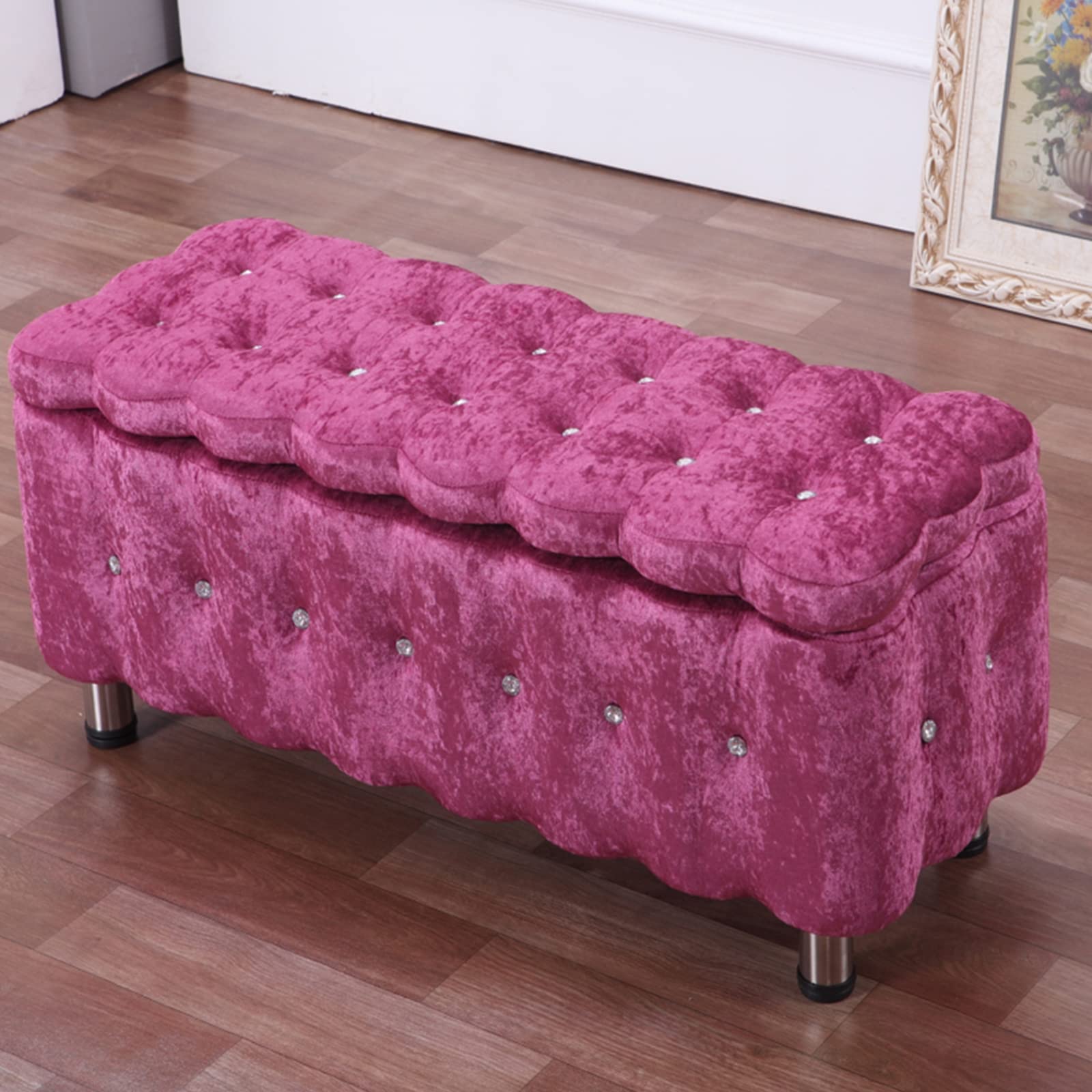 Banc de rangement ottoman velours rose pour optimiser une petite chambre