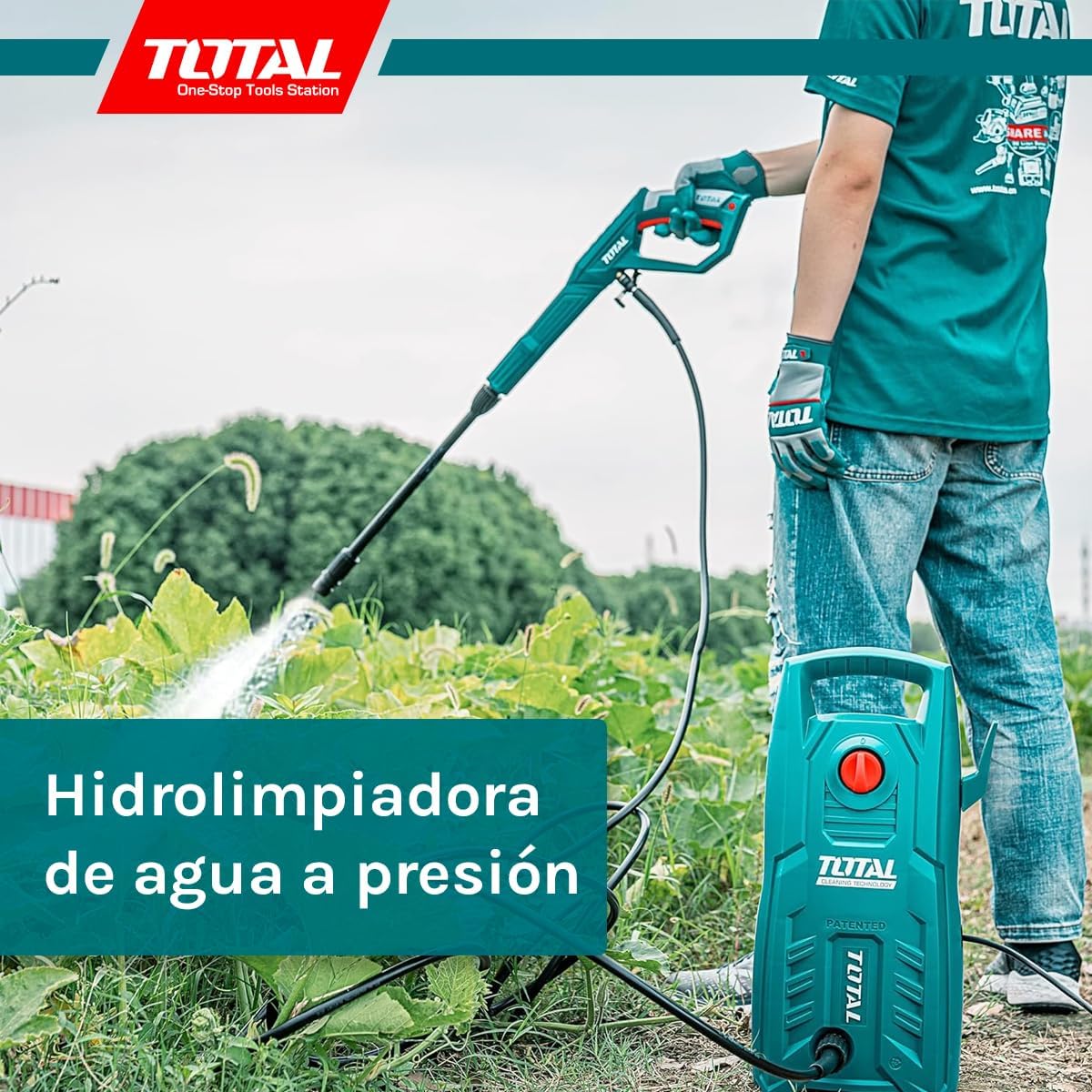 Person using the TOTAL TGT11316 Pressure Washer to clean a garden area, demonstrating its outdoor cleaning capability.