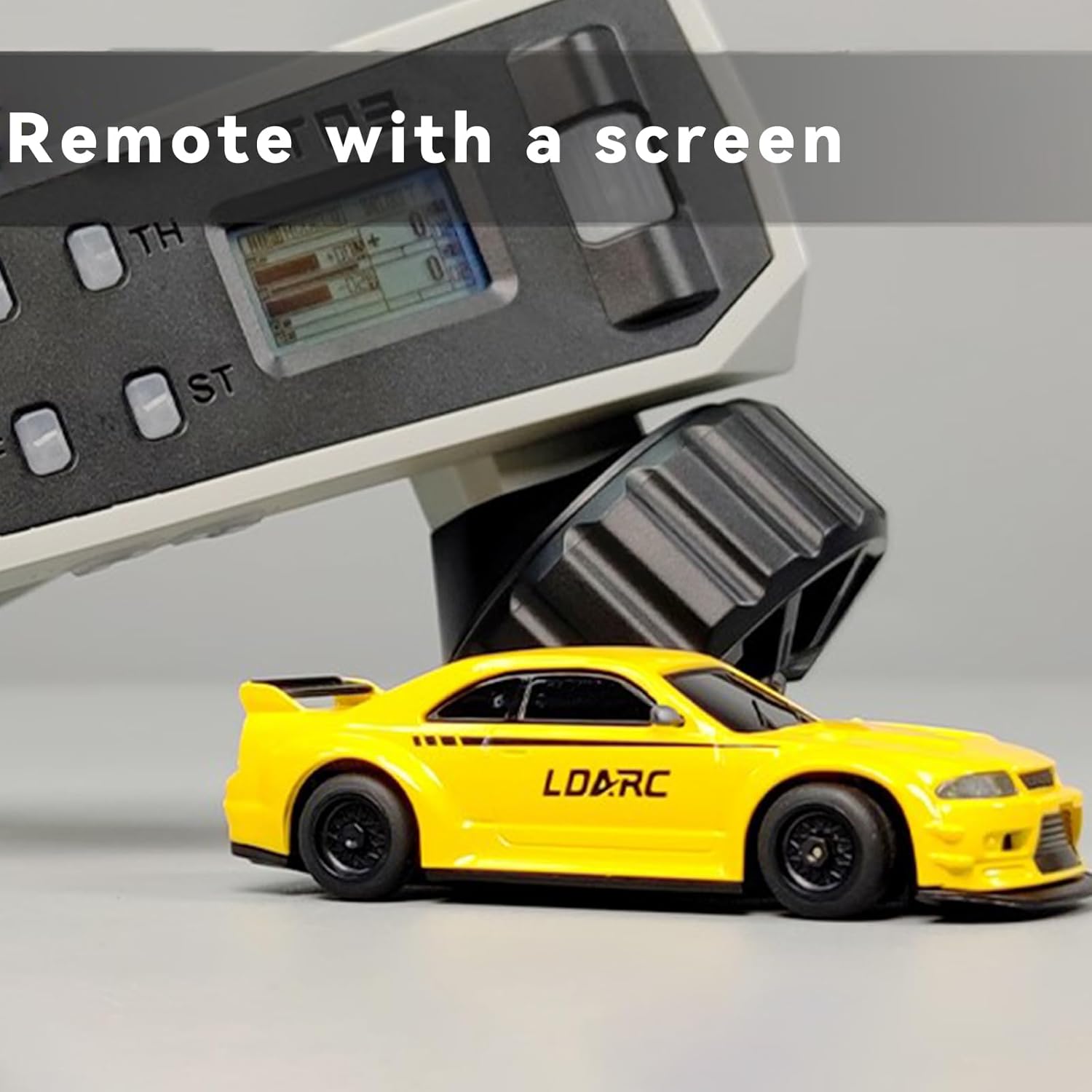 CT03 remote control with LCD screen and a yellow LDARC R02 RC car