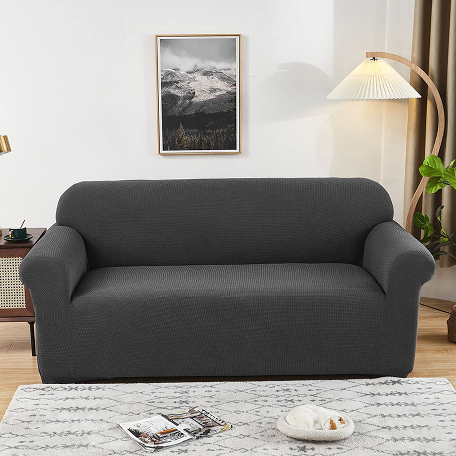 Housse de canapé extensible gris jacquard pour un salon chaleureux