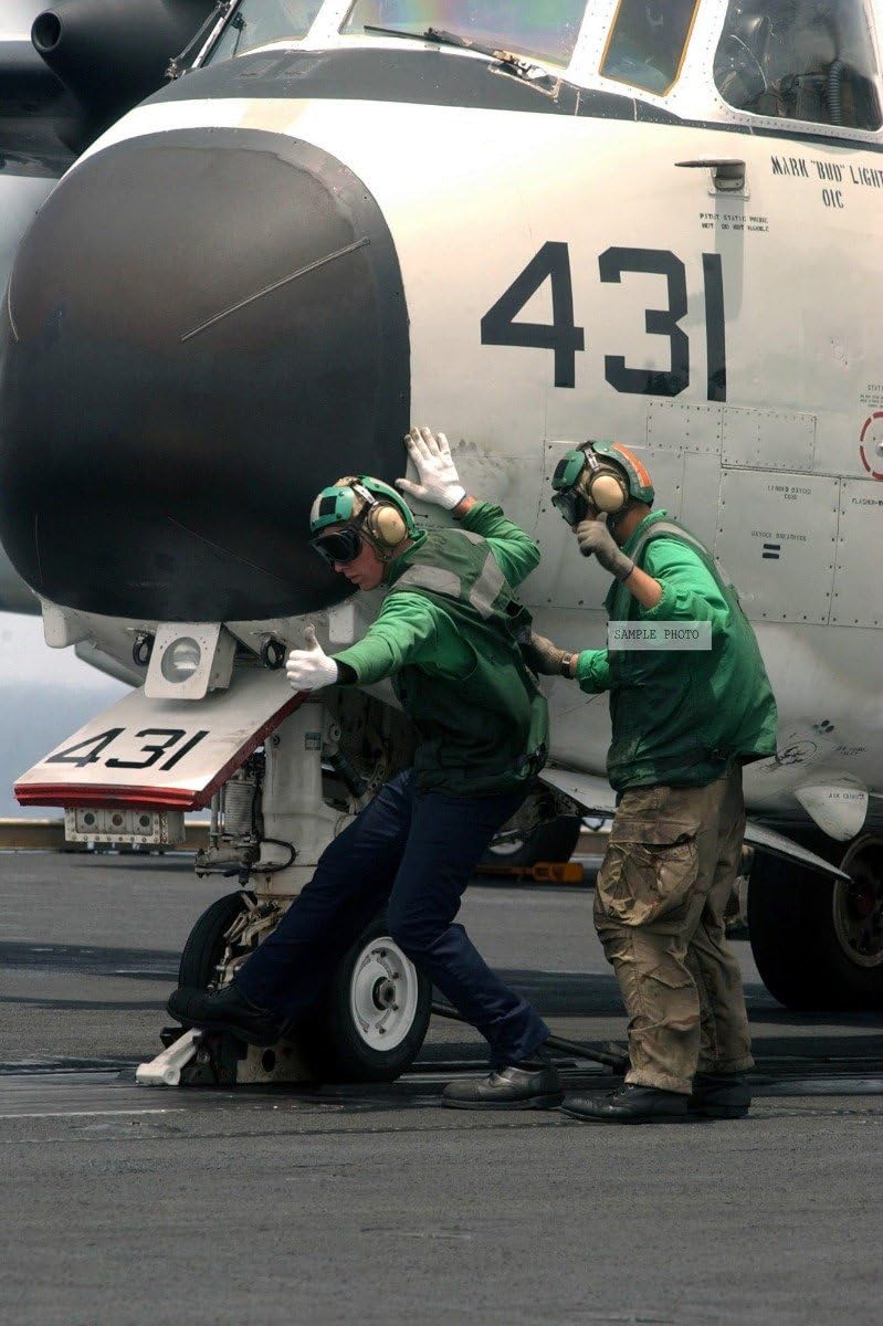 Photo Two US Navy (USN) catapult safety observer position a