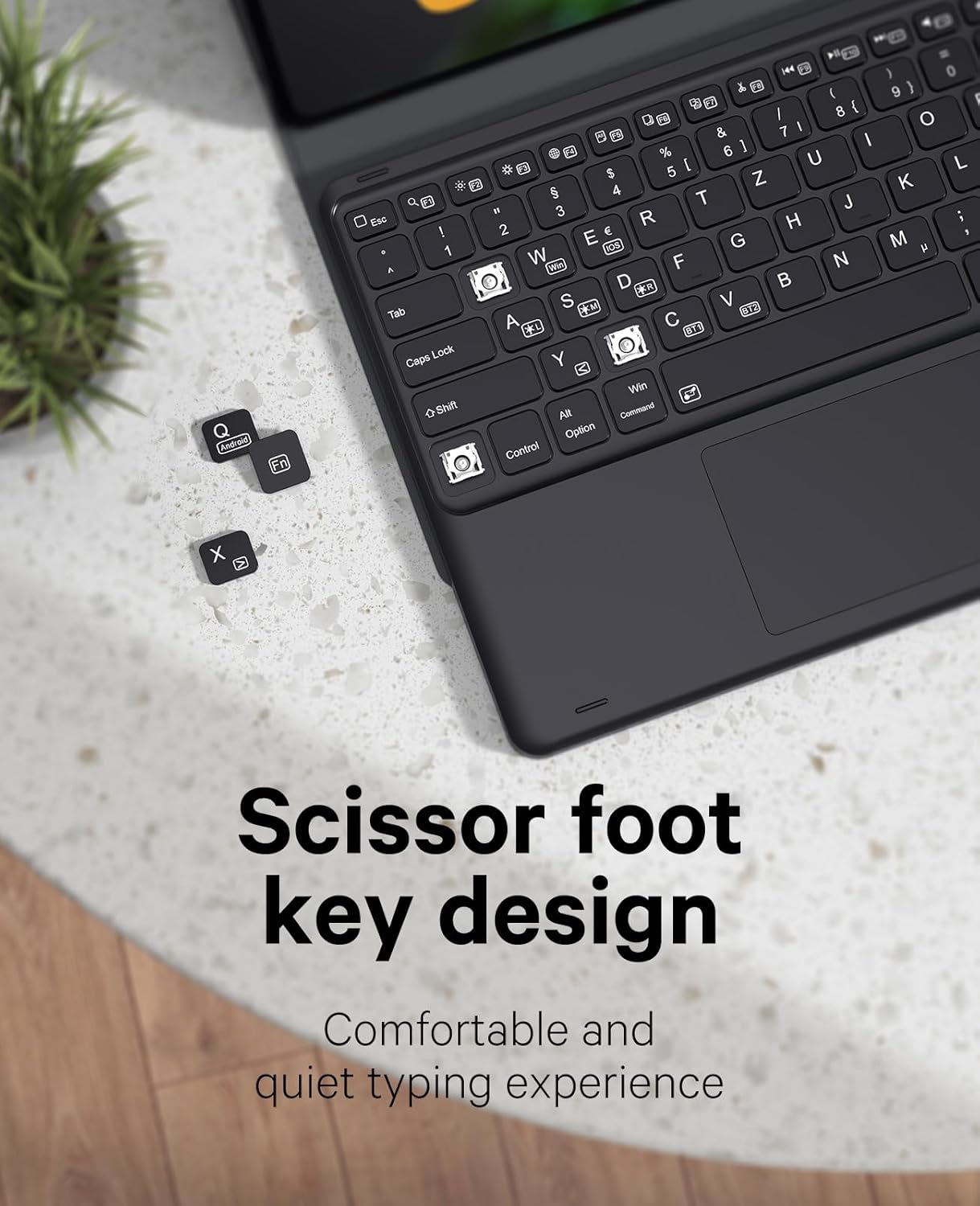 Close-up of the keyboard showing the scissor-foot key design.