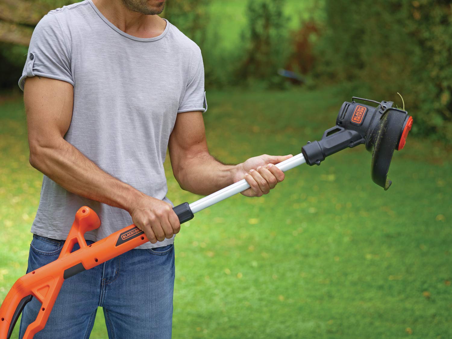 Black+Decker Akku-Rasentrimmer ST182320 (18V 2,0Ah, 25 cm Schnittbreite, AFS Reflex automatische Fadenverlängerung, für kleine und mittlere Gärten, inkl. Akku und Ladegerät)