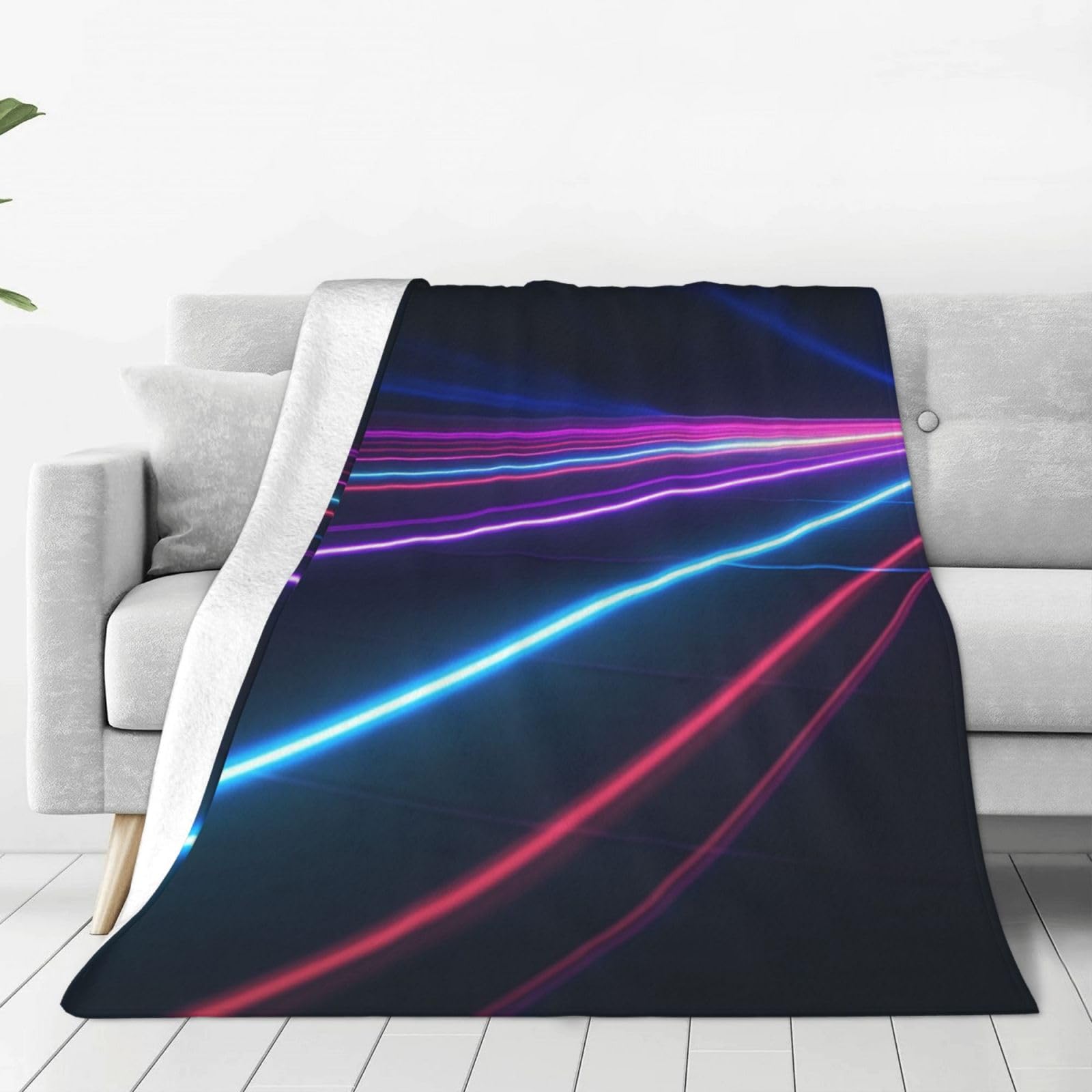 Couverture en micro polaire ultra douce pour éliminer la sensation de froid sur votre canapé