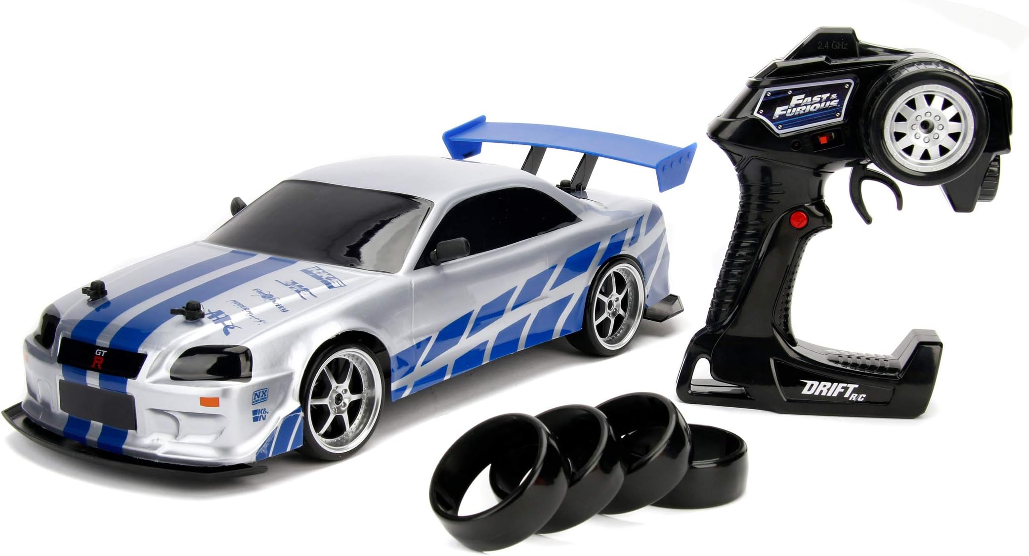 Jada Toys 253209000 Fast&Furious Fast And The Furious Fast & Furious Nissan Skyline GTR R34 RC Car with Radio Remote Control, Drift Function, 4 Tyres, USB Charging, Scale 1:10, Blue/Silver