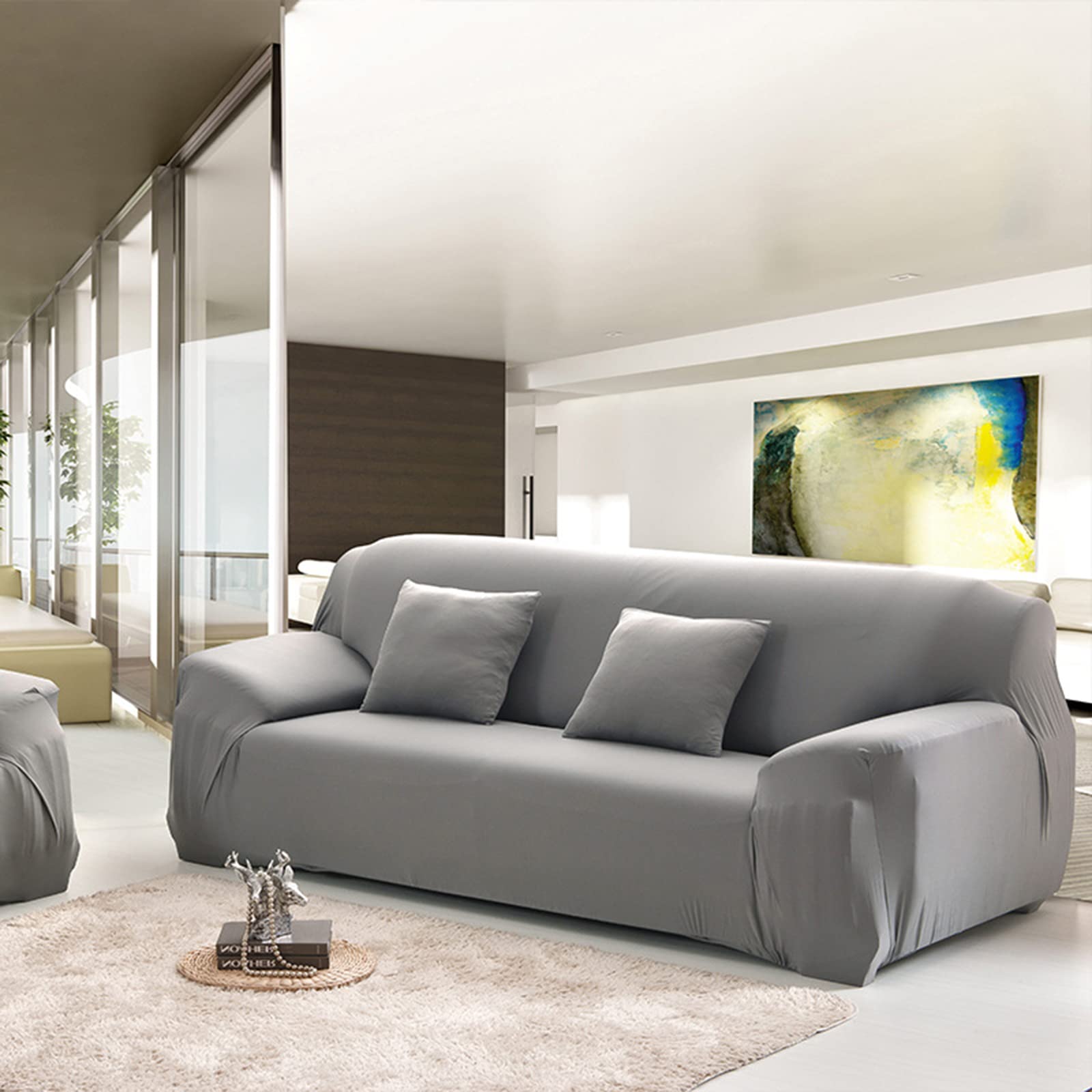 Housse de canapé extensible imprimée pour relooker votre salon en un clin d’œil