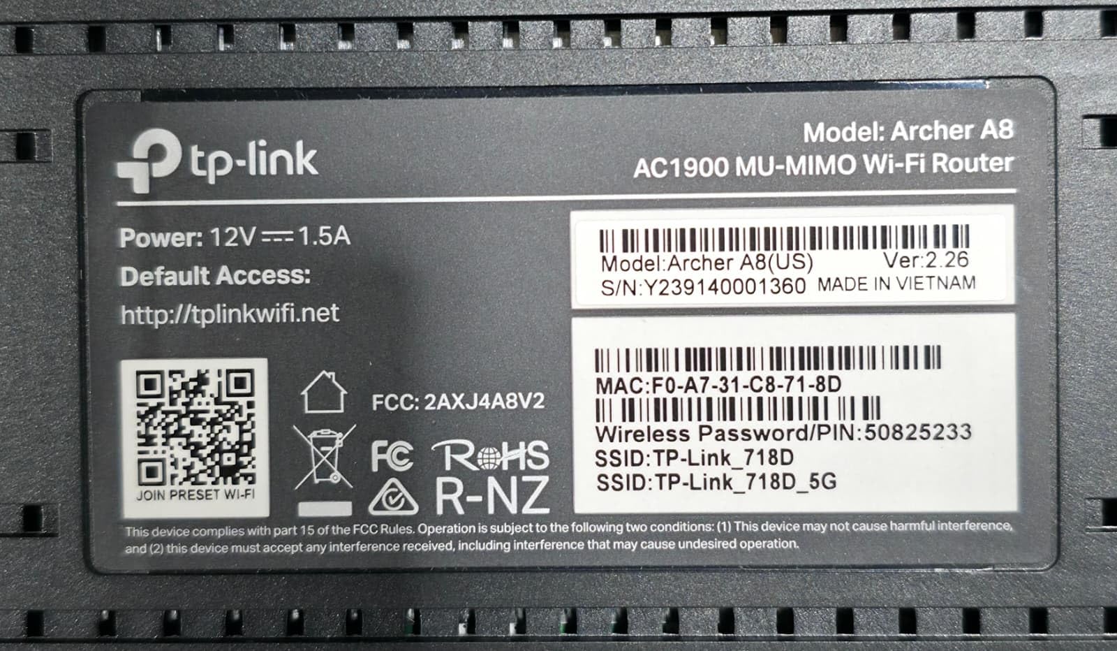 Bottom label of TP-Link Archer A8 router with model, serial, and default Wi-Fi information