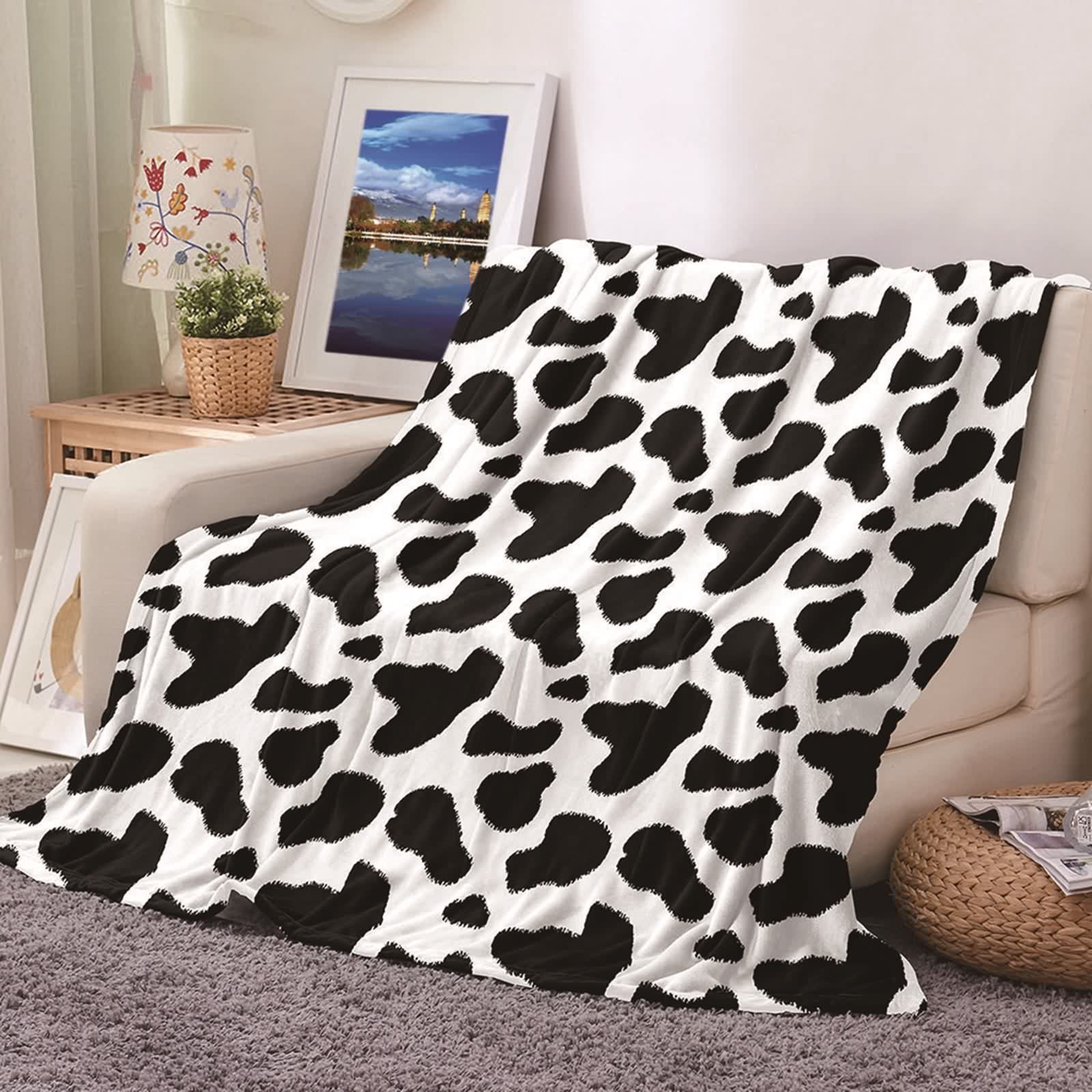 Couverture polaire en flannel imprimé vache pour cocooning sur le canapé ou le lit