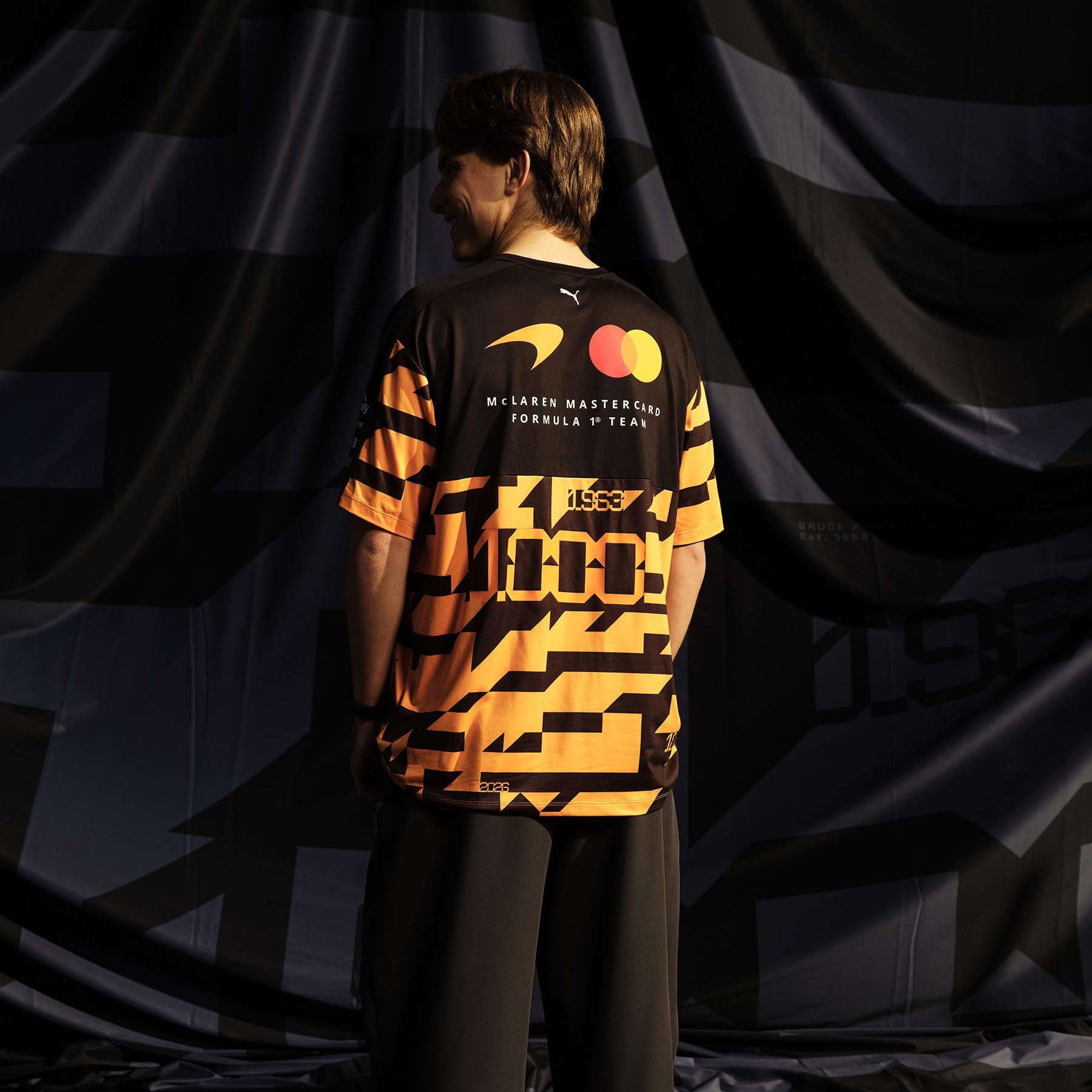PUMA McLaren F1 2026 T-Shirt Edizione Speciale 1000° GP - Arancione