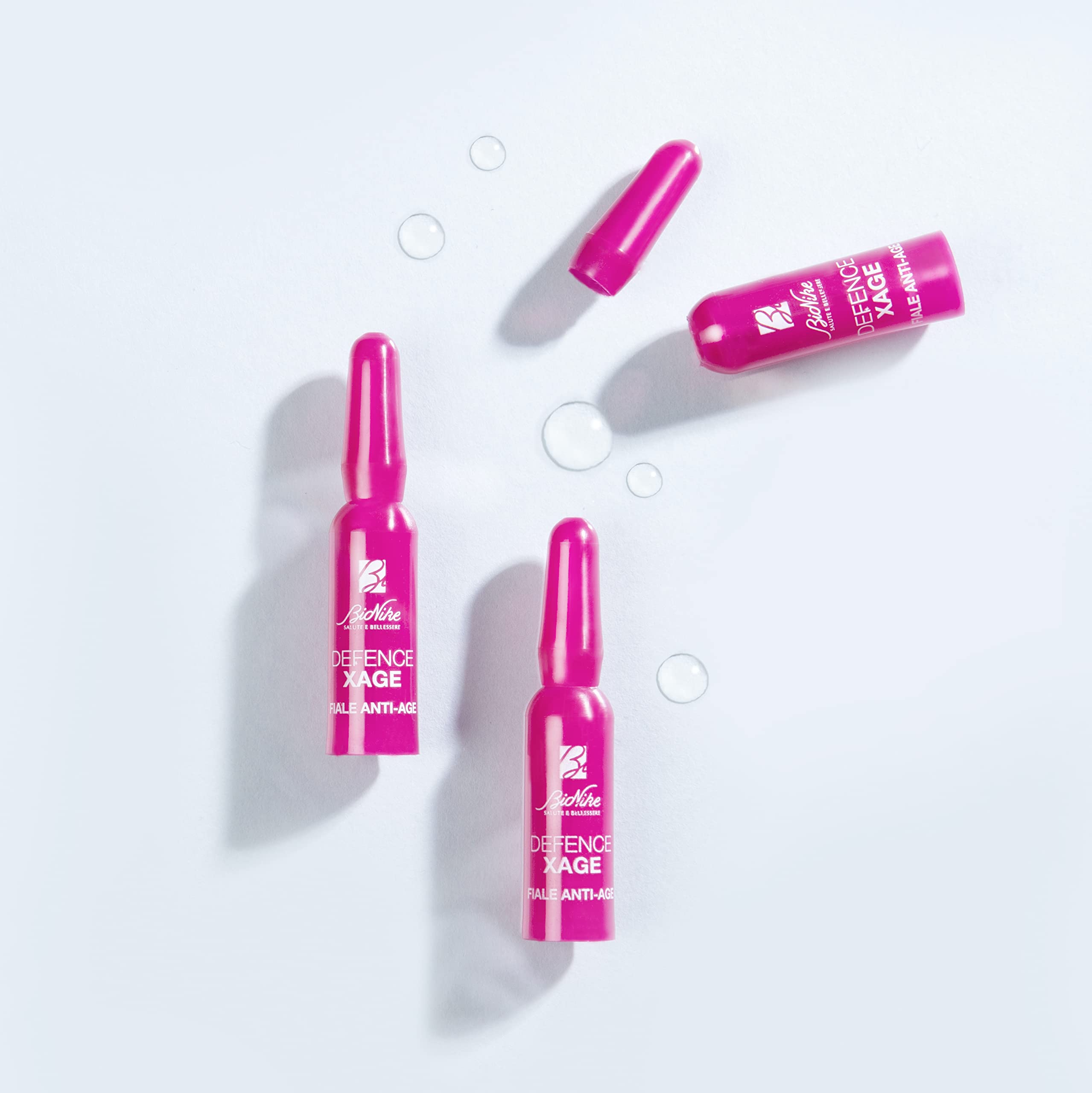 Bionike Defence Xage - Fiale Viso Concentrate Anti-età Multi-correttive, per Pelli Sensibili e Intolleranti, Azione Rimpolpante per Attenuare le Rughe, Donano Tonicità e Luminosità, 14 Fiale