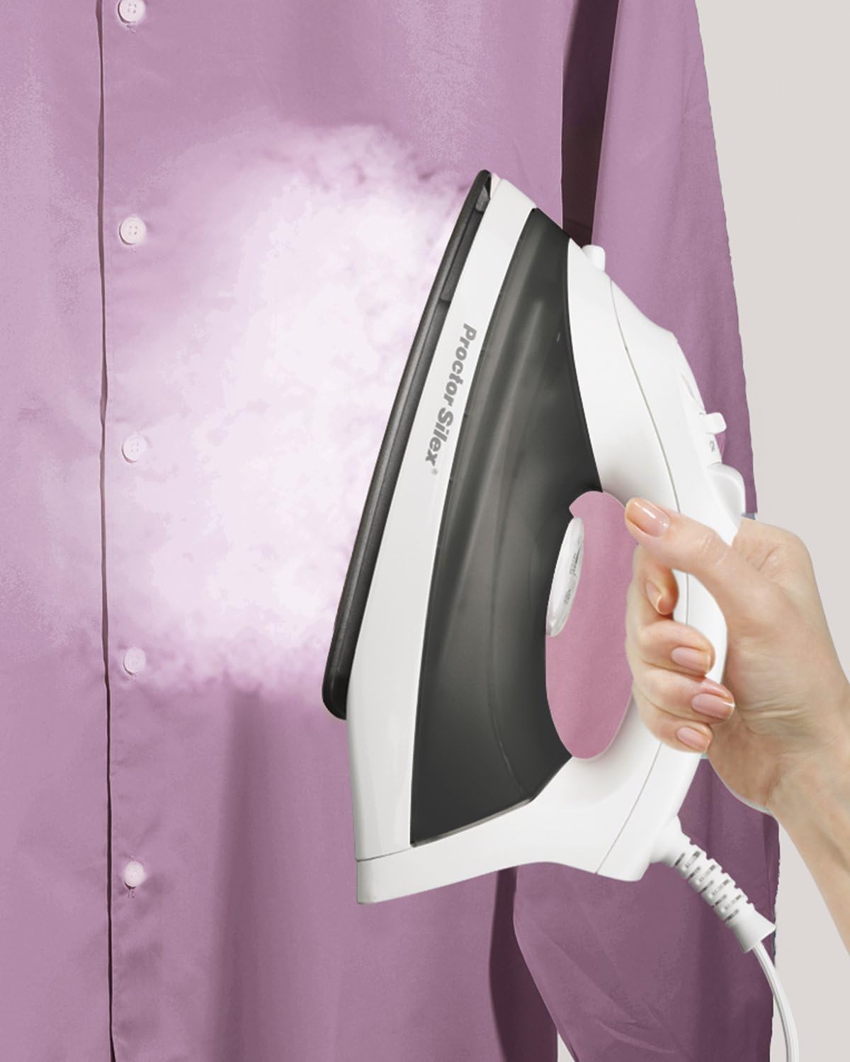 Proctor Silex Steam Iron used for vertical steaming on a purple shirt