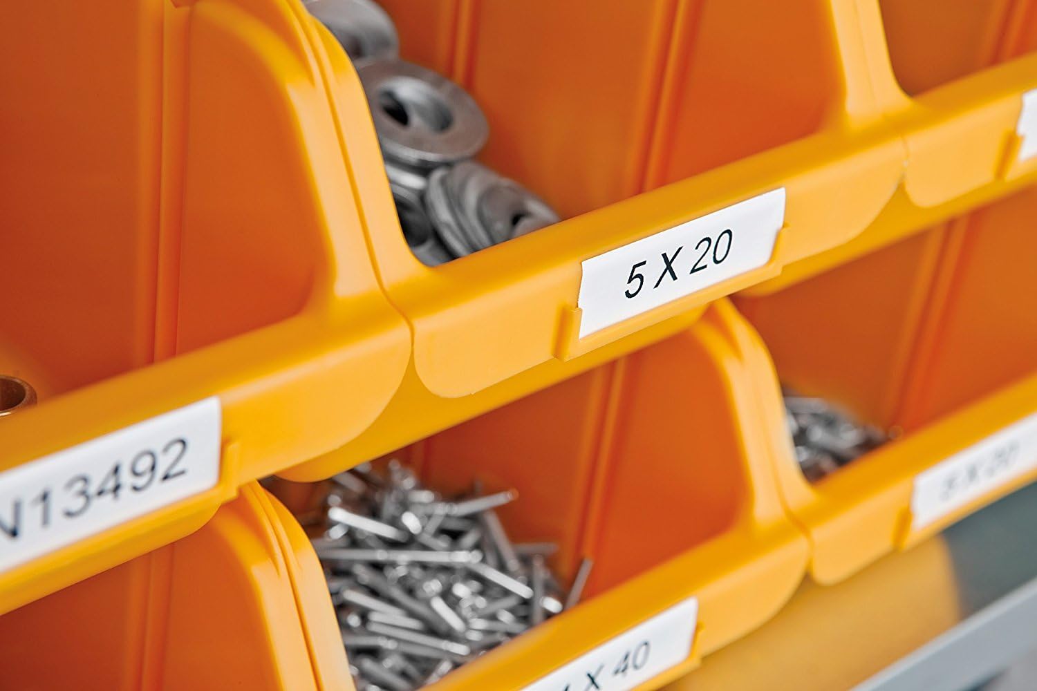 Storage bins with labels for small parts, created with DYMO RhinoPRO 5200