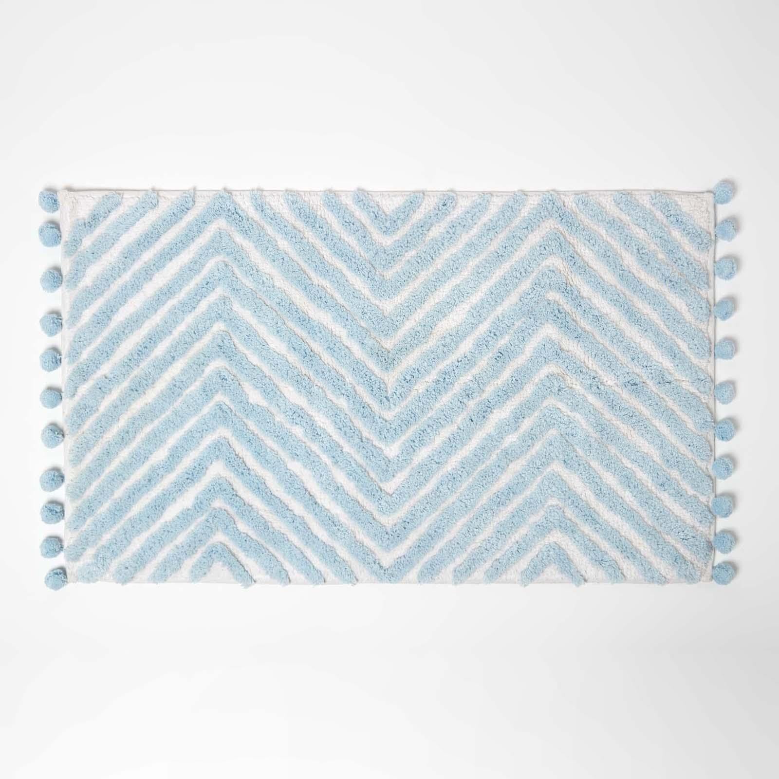 HOMESCAPES Blue Cotton Bath Mat with Zig Zag Design Super Absorbent Tufted Bathmat with Pom Poms, 50 x 80 cm