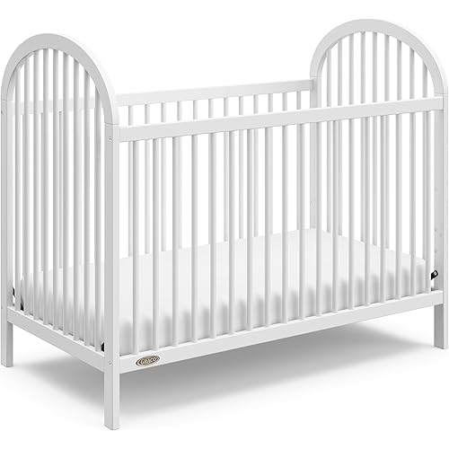 Graco Olivia Convertible Crib (White) – GREENGUARD Gold Certified, 100% Solid Wood, Fits Standard Crib Mattress, Converts to Toddler Bed and Daybed, 4 Adjustable Mattress Heights