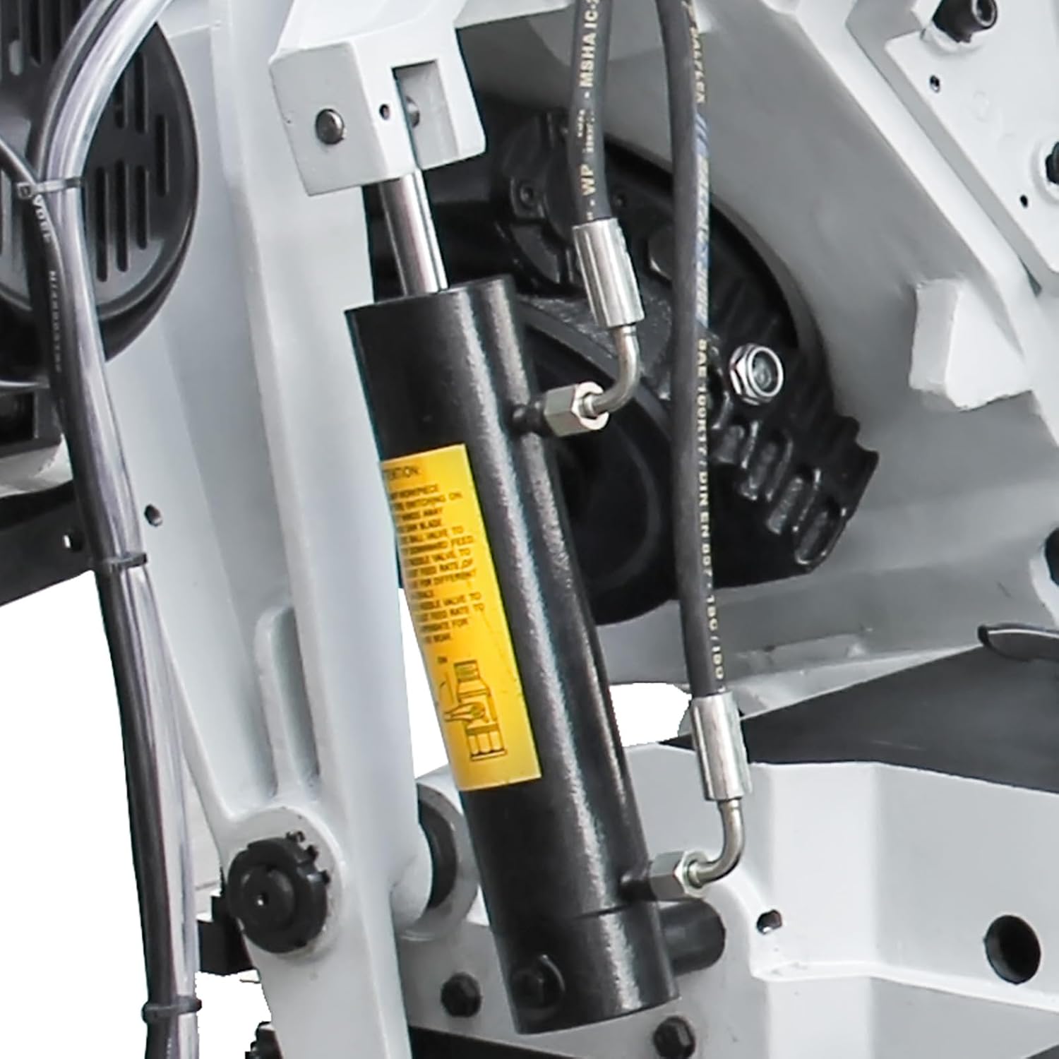 Close-up of the hydraulic descent control cylinder.