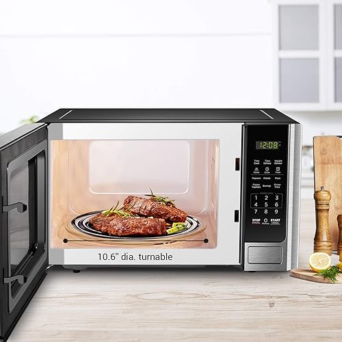 Vista 5 de BLACK+DECKER Microondas digital con puerta giratoria y botón de seguridad para niños