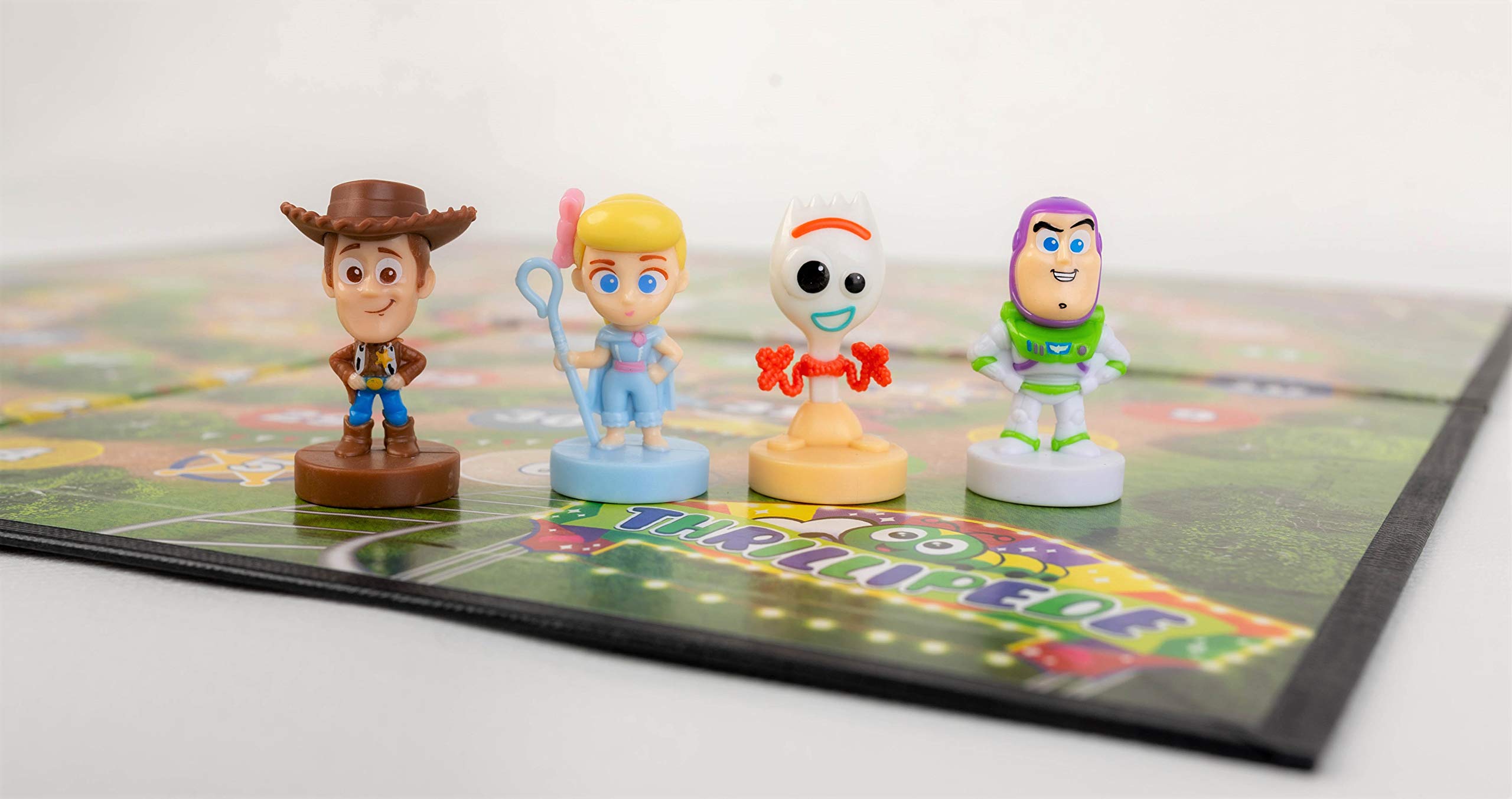 Disney Gioco da tavolo ufficiale Toy Story 4 Race Home, 16 Toy Story 4 pezzi da gioco inclusi, ottimo regalo per un massimo di 4 giocatori, età 3+