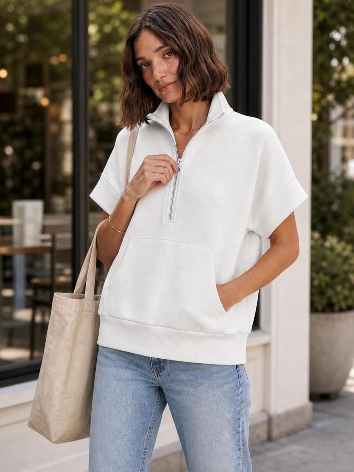Women's Half Zip Sweatshirt Short Sleeve Pullover | Relaxed shape, mock neck, wide sleeve bands, front pouch pocket and ribbed hem; machine washable for everyday wear.