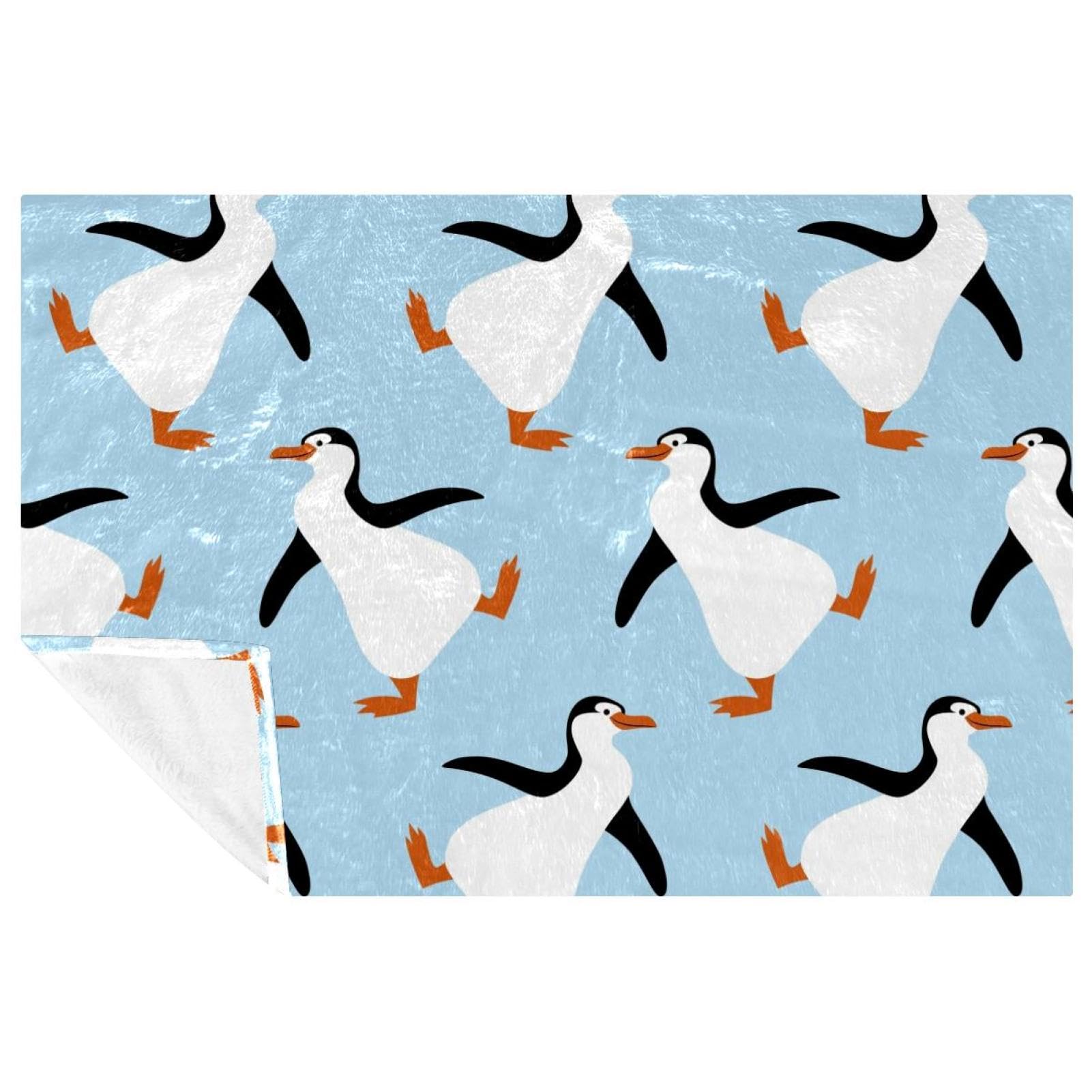 Couverture douce et chaude imprimé pingouins pour envelopper toute la famille de tendresse