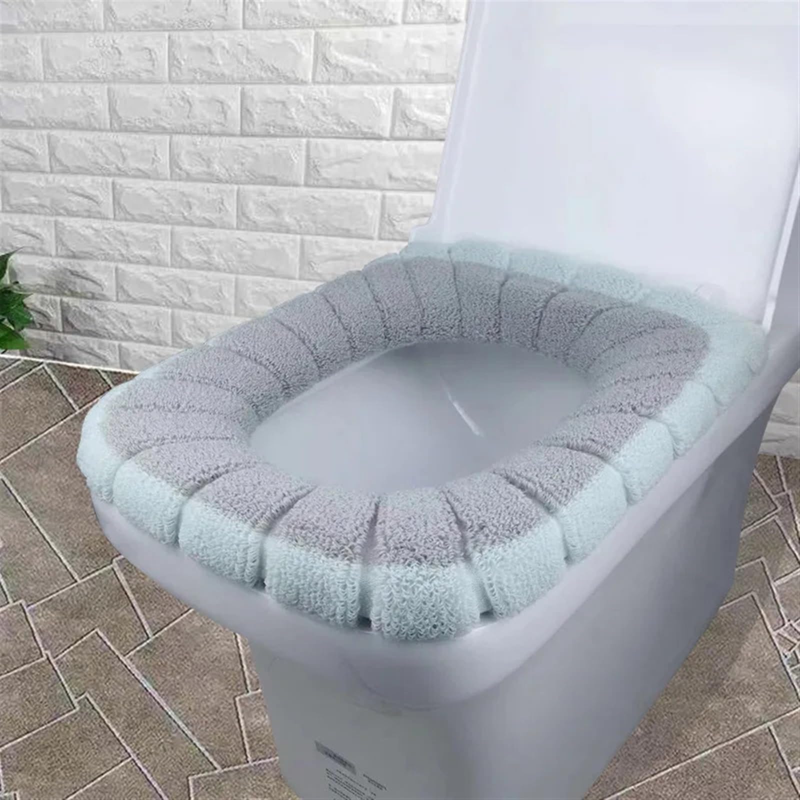 Évitez le froid aux WC avec cette housse de siège de toilette lavable et brodée