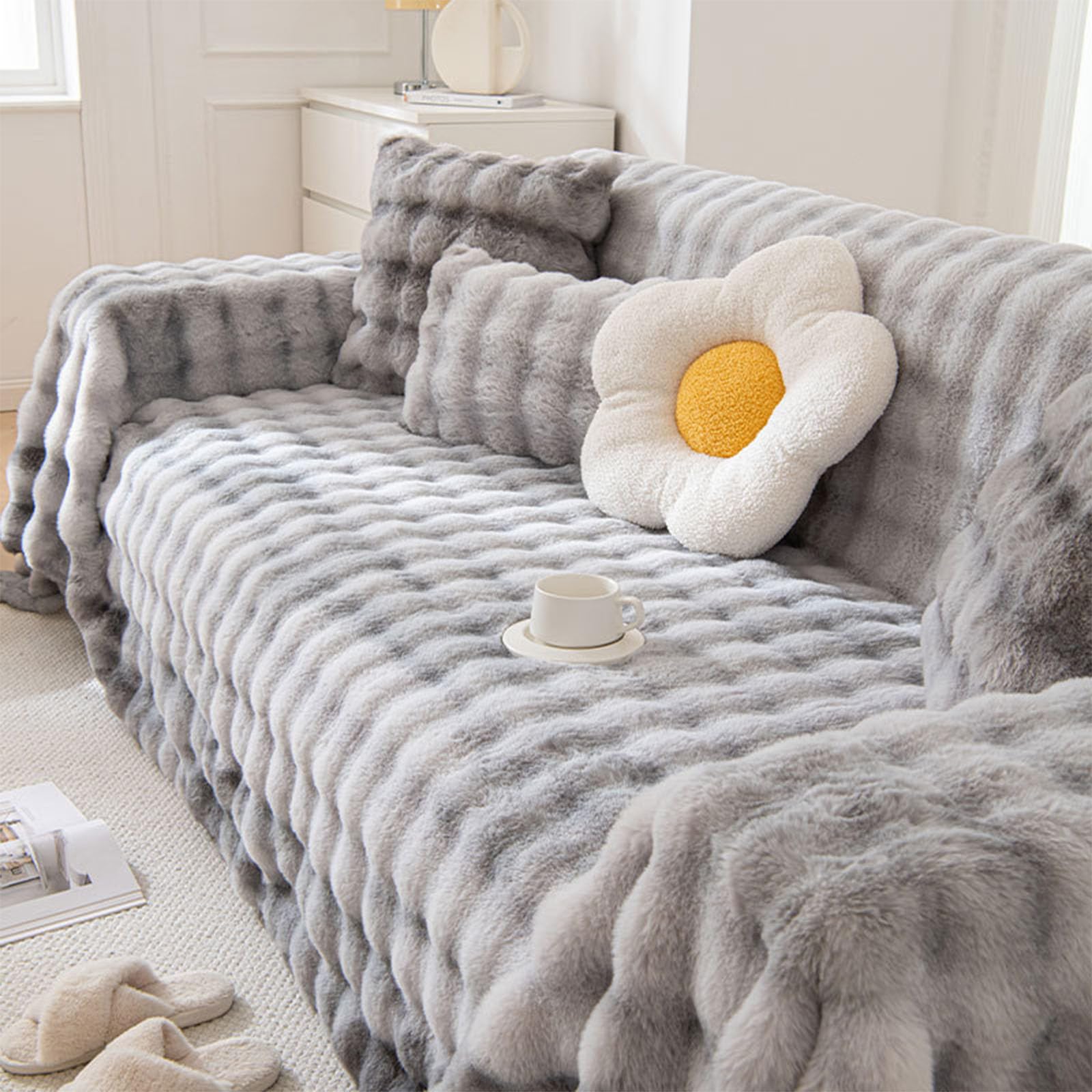 Housse de canapé en fausse fourrure pour des soirées cocooning sur canapé d'angle en L