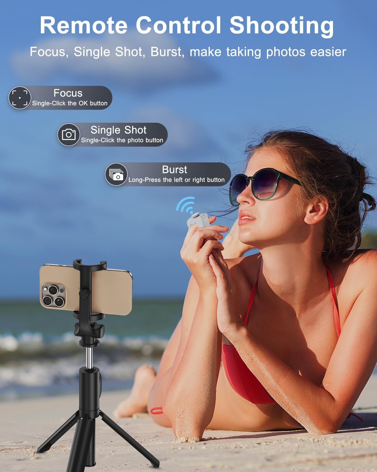 A person on a beach using the scrolling ring to remotely control their phone camera for taking photos.