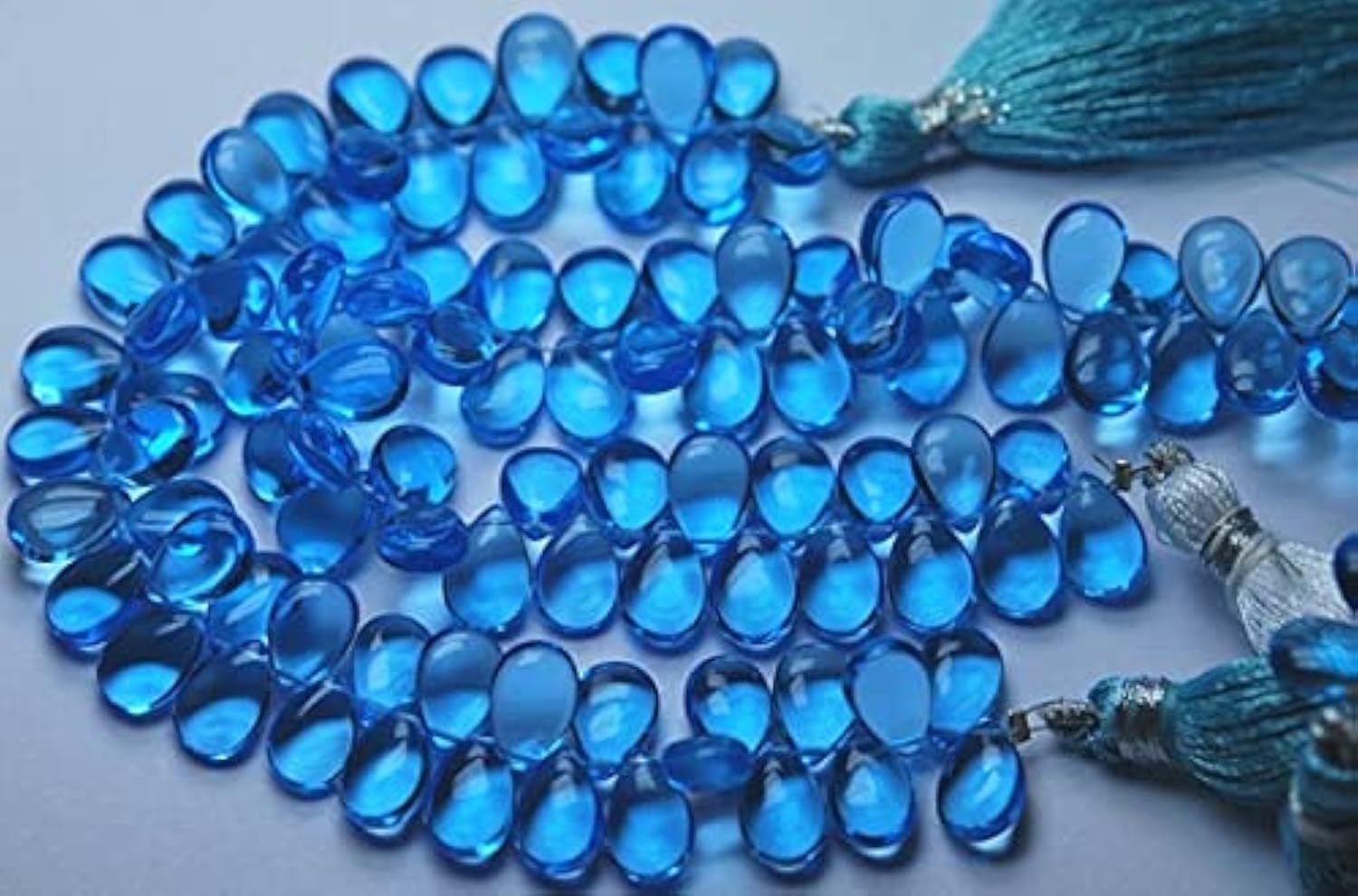 Quartz bleu ciel perle poire 7x10mm briolette lisse fil minéraux
