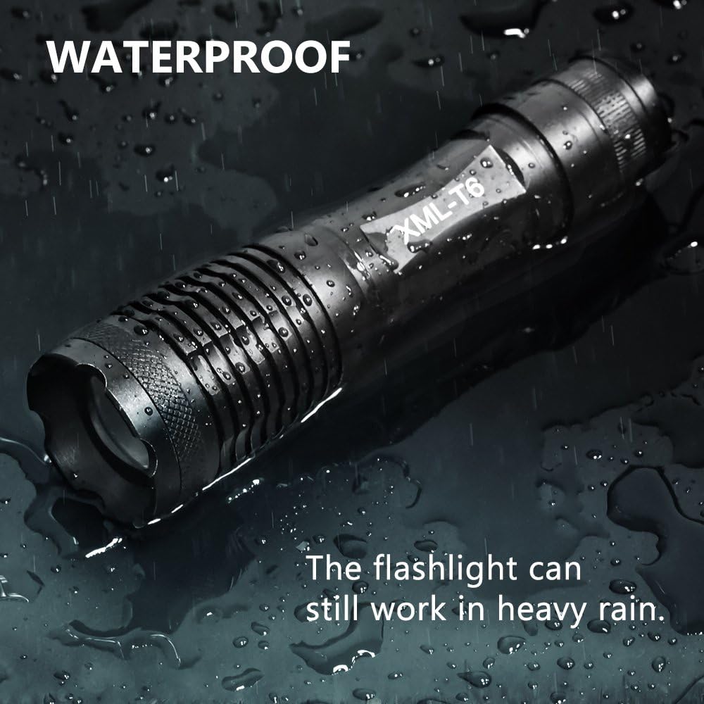 Flashlight being splashed with water, demonstrating water resistance