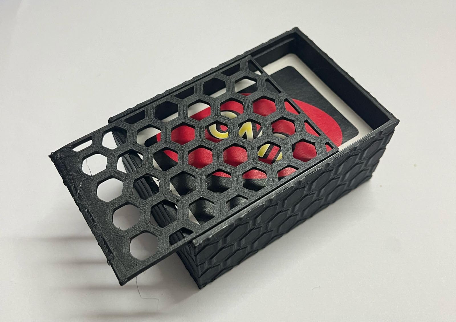 The Poka Company 3D Printed Hexagon Patterned Hard Cover Case Compatible with U-N-O Playing Cards (Hexagon Patterned Sliding Type case Without Cards) - Case Size: 65mm x 95mm x 44mm (Black) (B0D579PRGN) Amazon Price History, Amazon Price Tracker