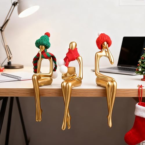 Miniatura 7 de Juego de 3 estatuas de pensador dorado para decoración del hogar, estantería escultórica y decoración de escritorio con mini sombreros de Papá Noel,