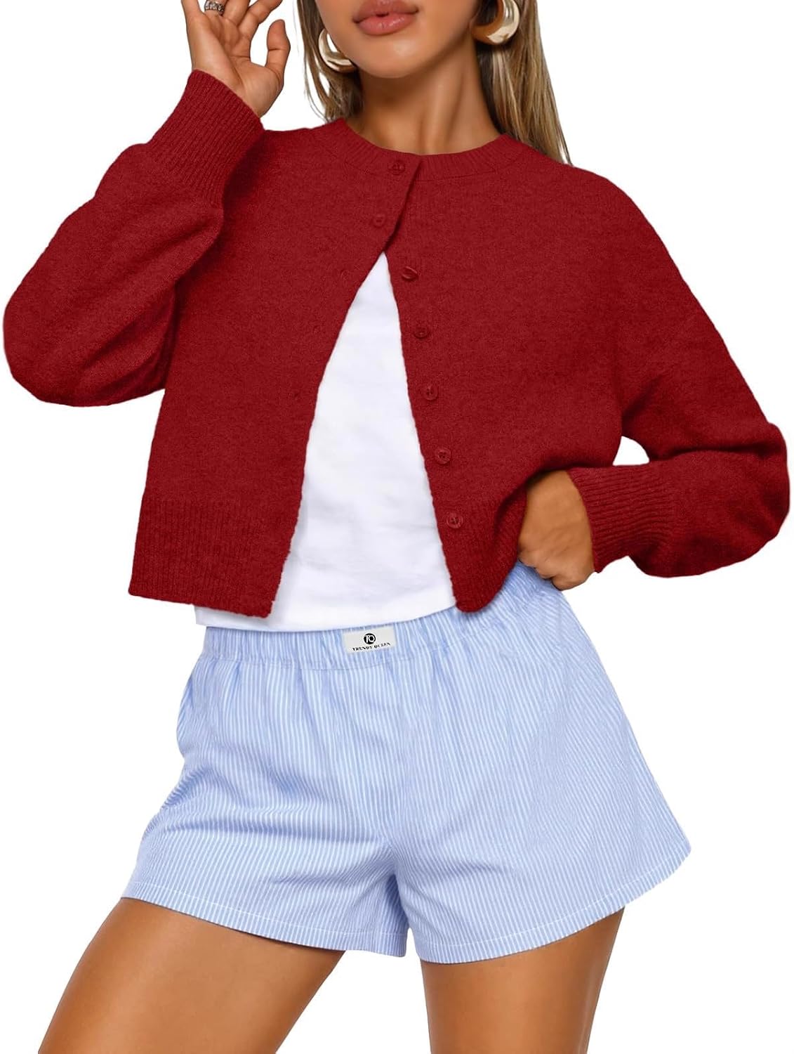 Women's Short Knitted Cardigan Sweater, a Fashionable Autumn Dress with Buttons and a Crop top Made Black