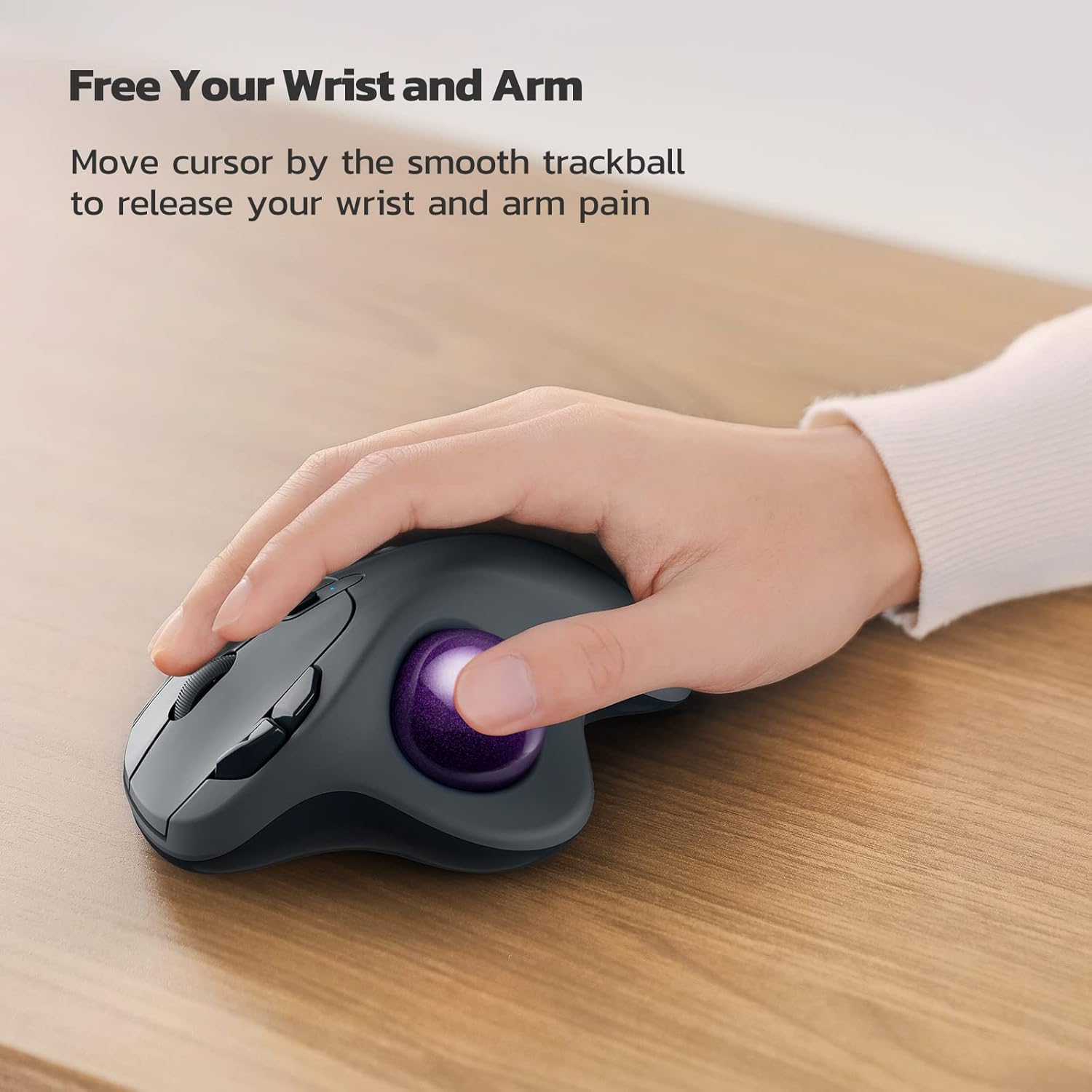 Hand resting on Nulea M501 trackball mouse, showing ergonomic use