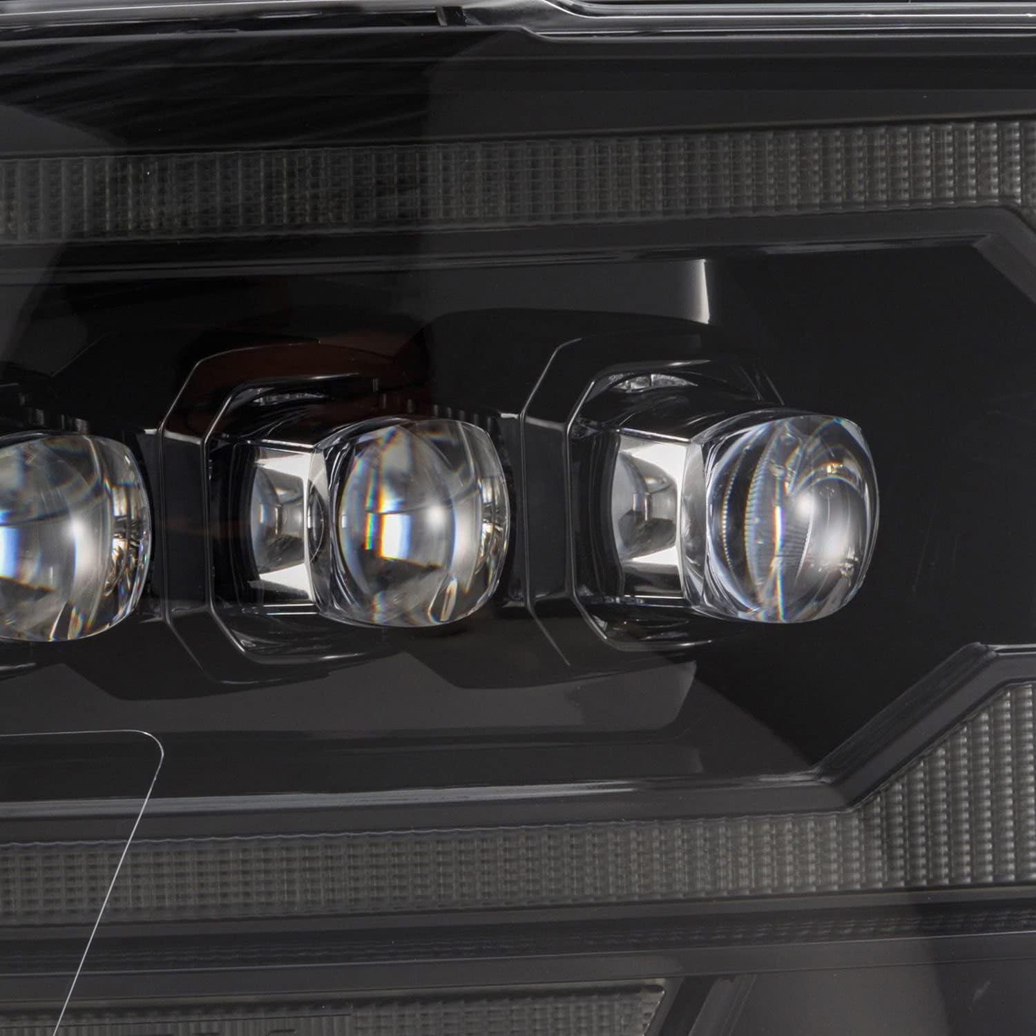 Close-up of the NOVA-Series headlight with white LED Daytime Running Lights (DRL) illuminated.
