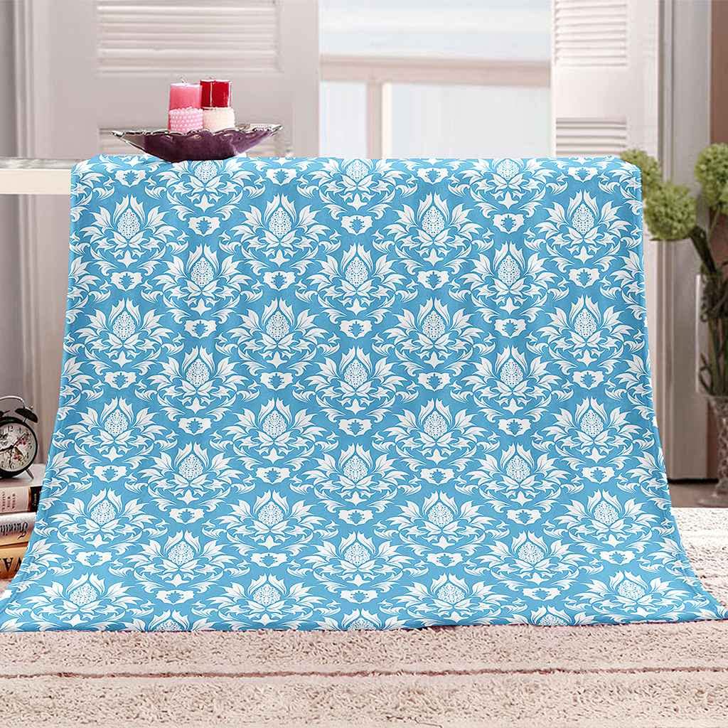 Couverture flanelle bleu pour vos soirées cocooning sur le canapé ou en voyage