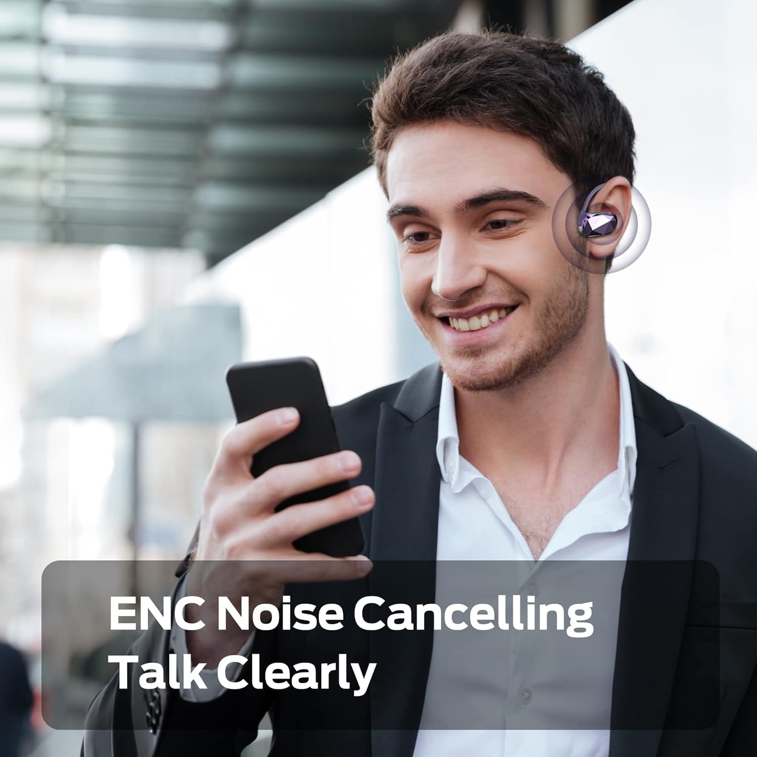 Man listening to music with Monster Aria Free headphones.