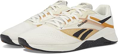 Reebok(リーボック) 男女兼用 大人用 ナノ X4 スニーカー, チョーク/ブラック/レトロゴールド, 10 Women/8.5 Men