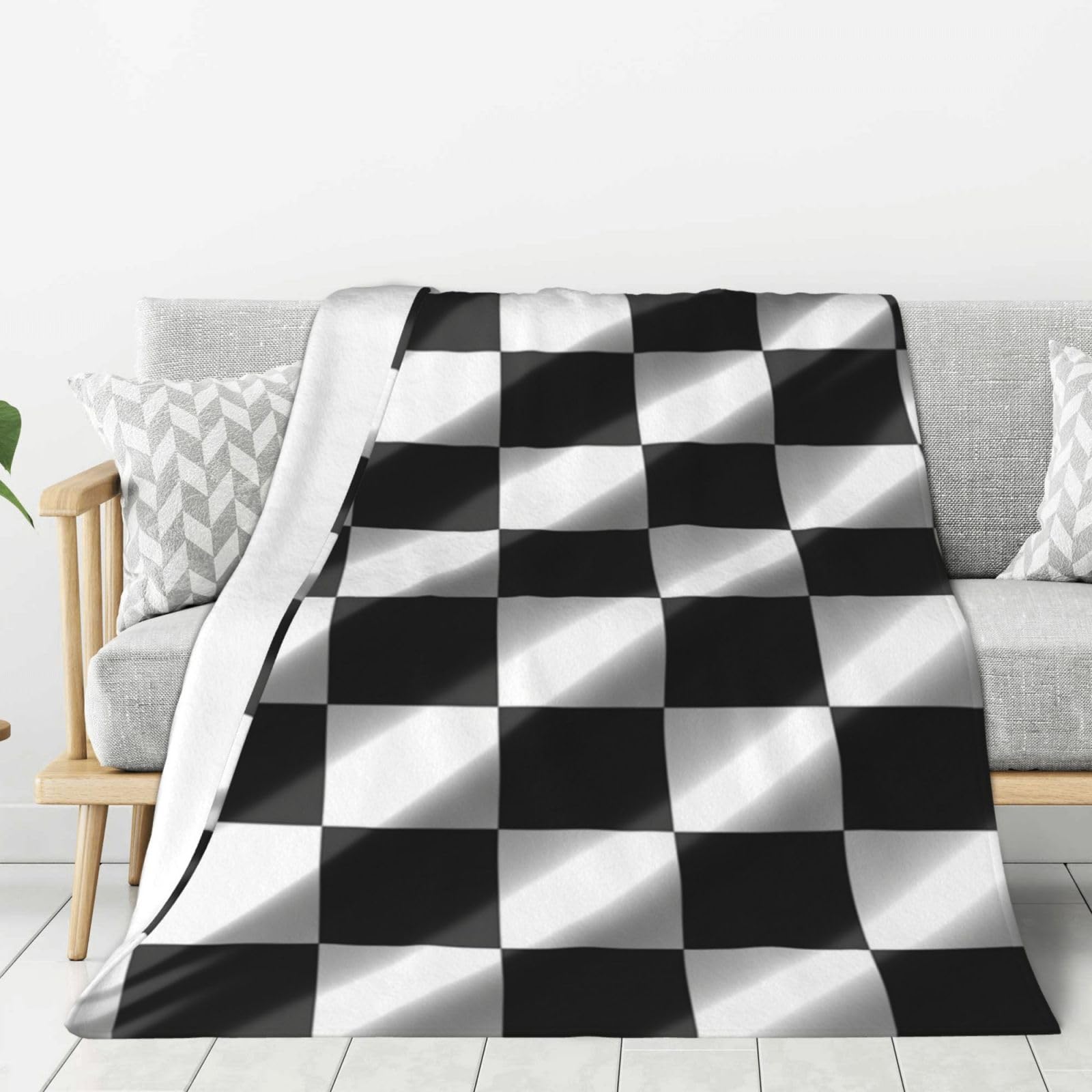 Couverture en flanelle légère pour rester au chaud sans transpirer sur le canapé ou au lit