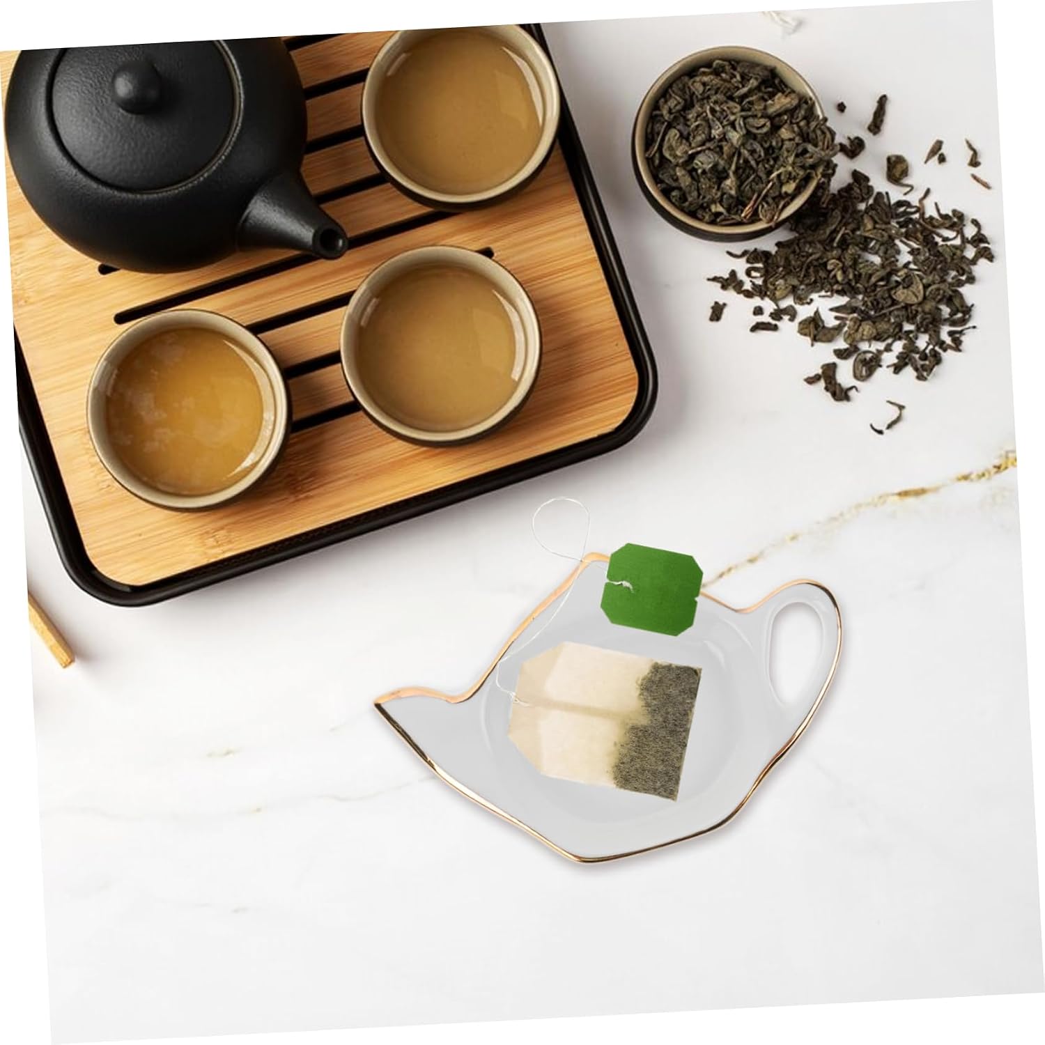 Luxshiny 4pcs Teapot Shaped Ceramic Tea Bag Coasters with Golden Edging Multi Purpose Tea Bag Holders and Organizers for Home Kitchen Drip Saucer for Clean Tables