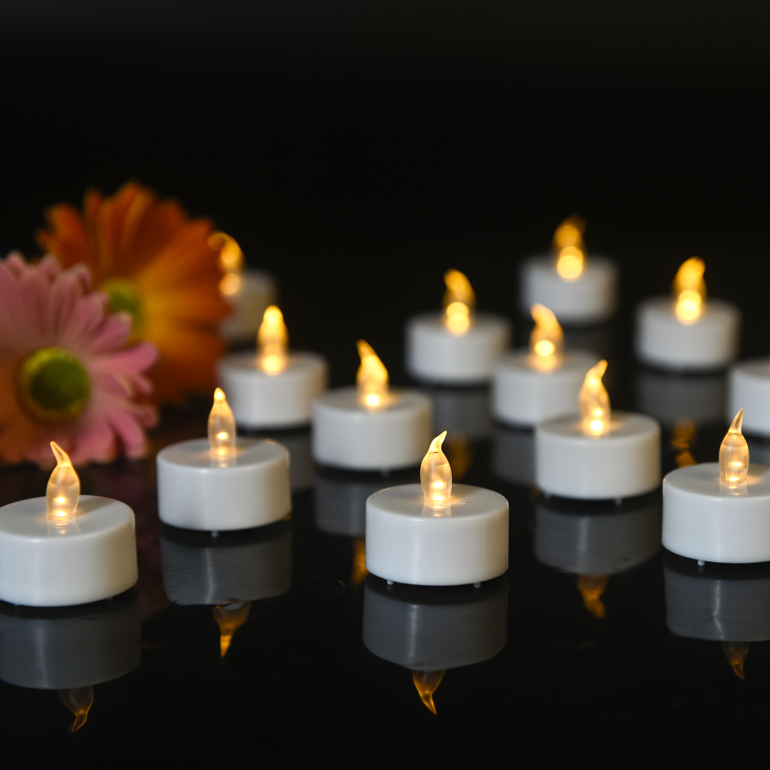 Battery Tea Lights 12 Pack - Led Tea Lights Flickering,Realistic and Bright Flameless Candles,The Duration of use is 200 h+,for Halloween Weddings Festivals Decoration in,Warm Yellow