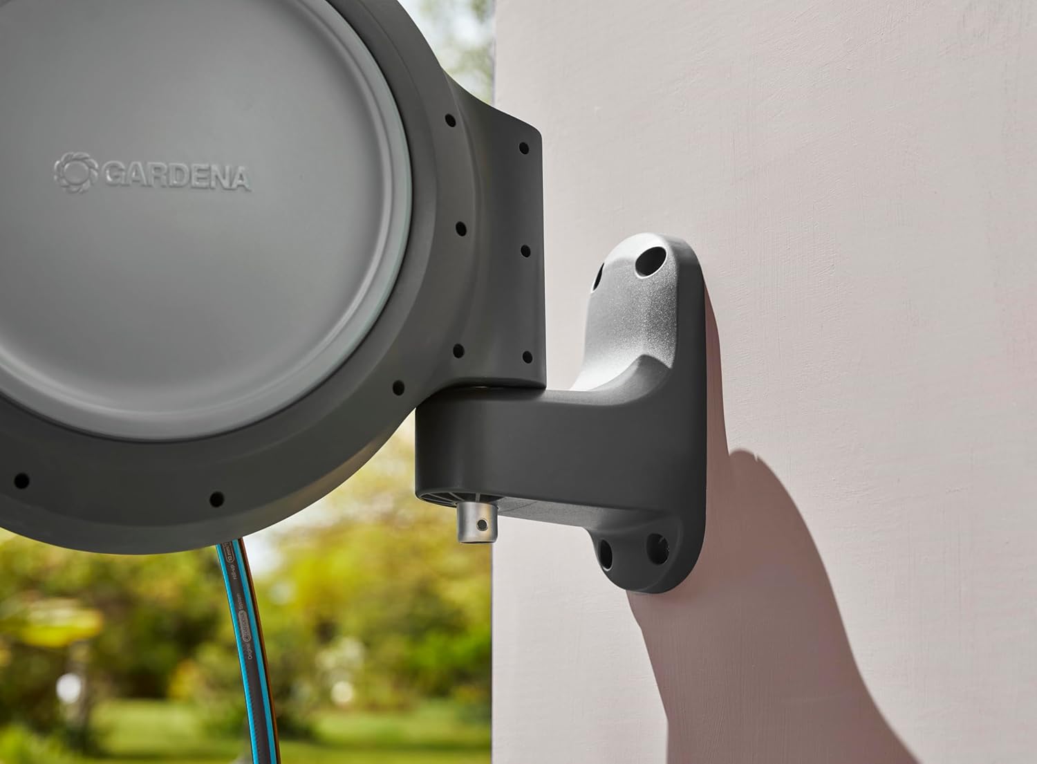 GARDENA Retractable Hose Reel, 80 ft Premium 9/16" High Flow Hose with Spray Nozzle, Wall Mount, Spring-Loaded Auto Rewind - US Hose threads + Quick Connect System