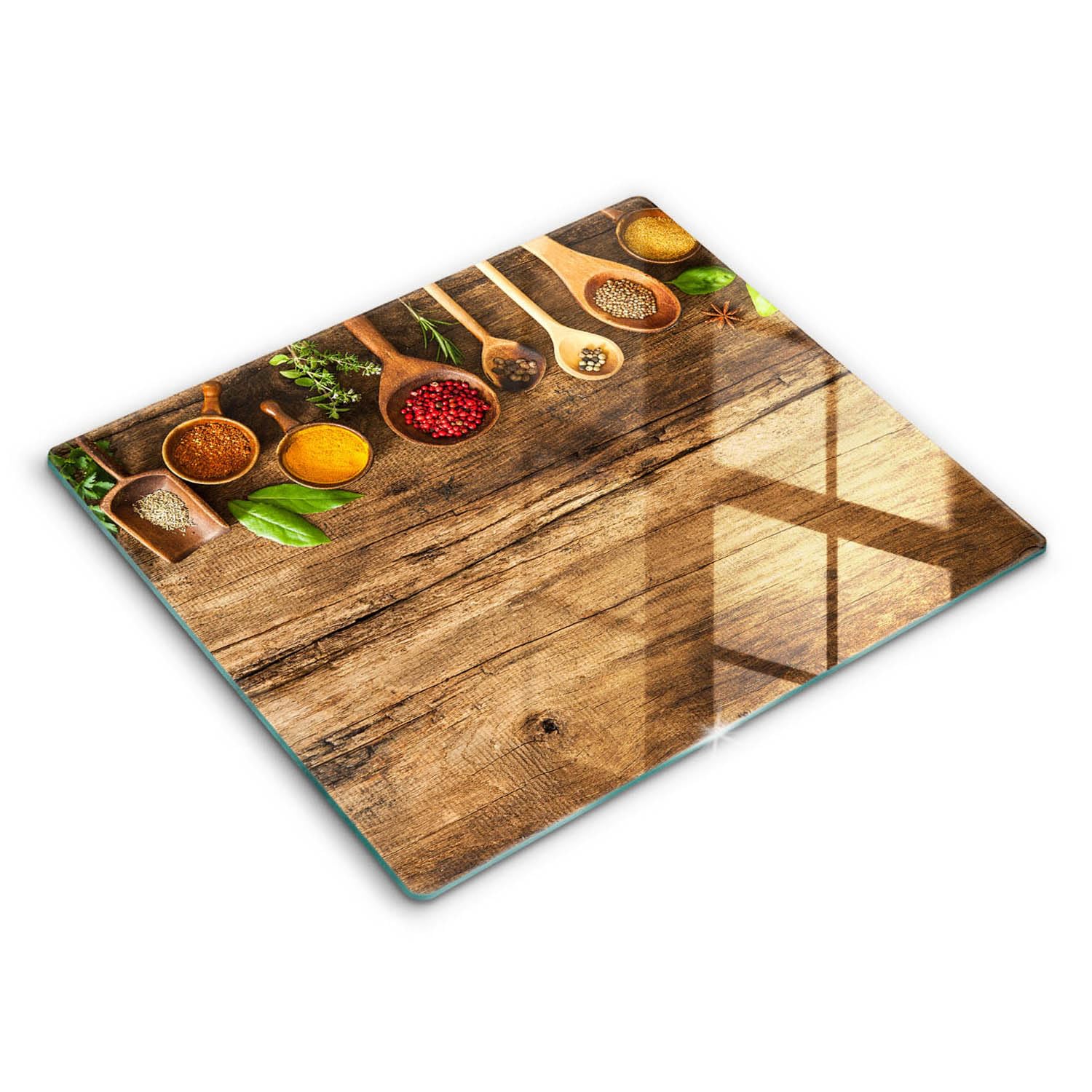 Plaque de cuisson induction protégée avec la planche à découper en verre Wallfluent 60x52cm