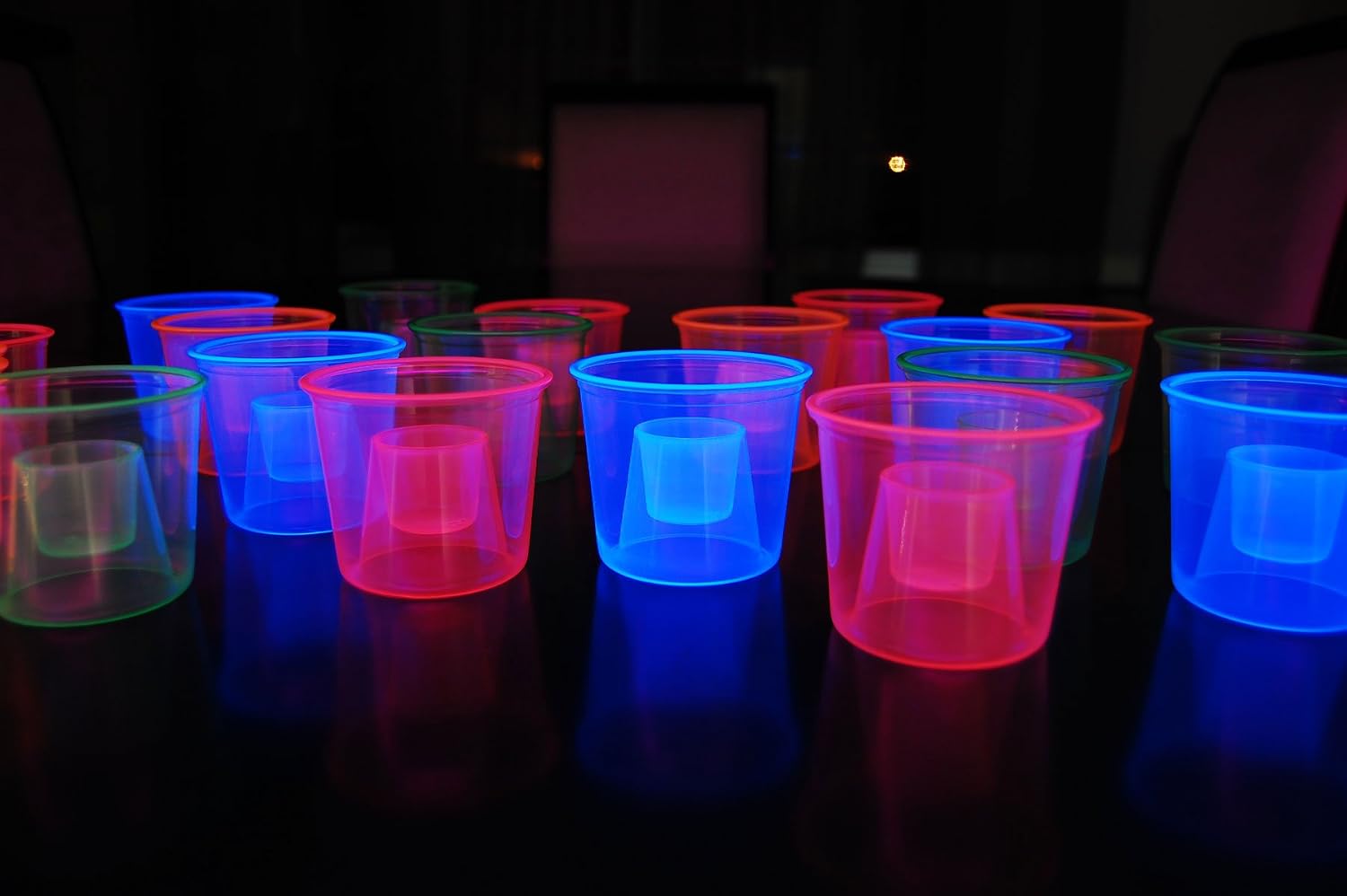 DirectGlow 4 Ounce Assorted UV Blacklight Reactive Soft Plastic Bomber Glow Party Shot Glass Cups (120 Count)