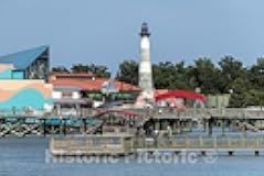 Photo- An old, abandoned lighthouse is a centerpiece of the Broadway at the Beach amusement and entertainment area in Myrtle Beach, South Carolina 1 Fine Art Photo Reproduction 12in x 08in