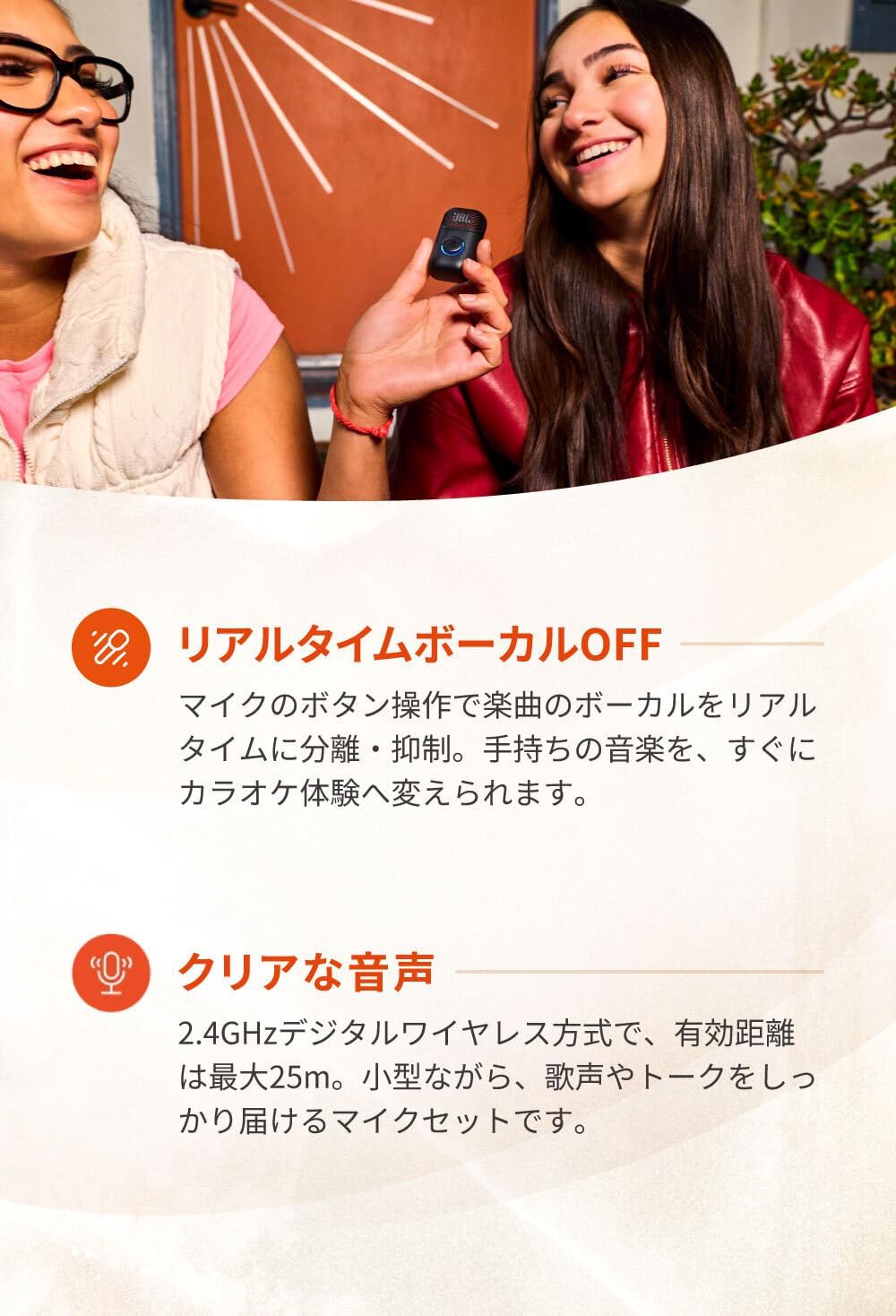 Two people smiling, one holding the JBL EasySing Mic Mini Duo, demonstrating its use for vocal performance.