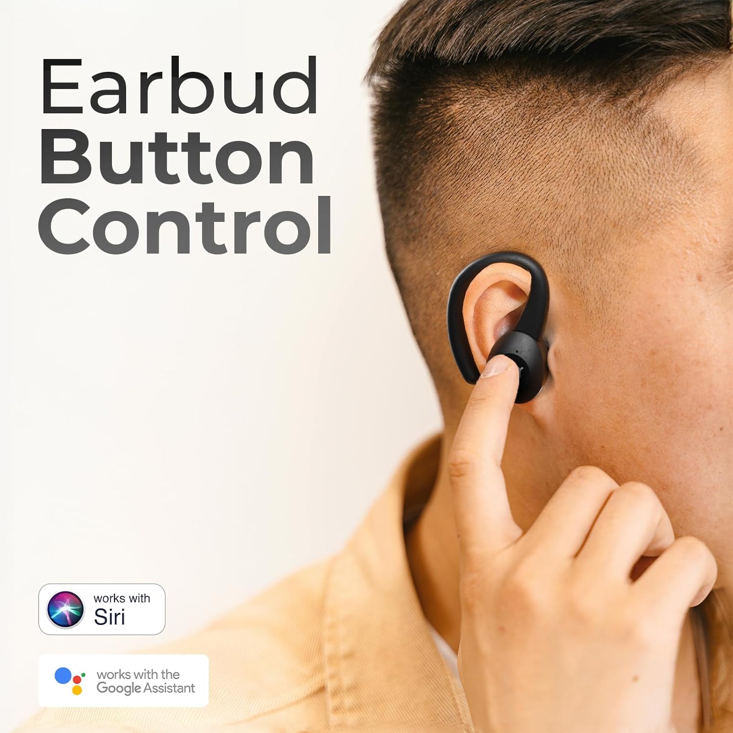 Person touching the iJoy earbud for control, indicating compatibility with Siri and Google Assistant