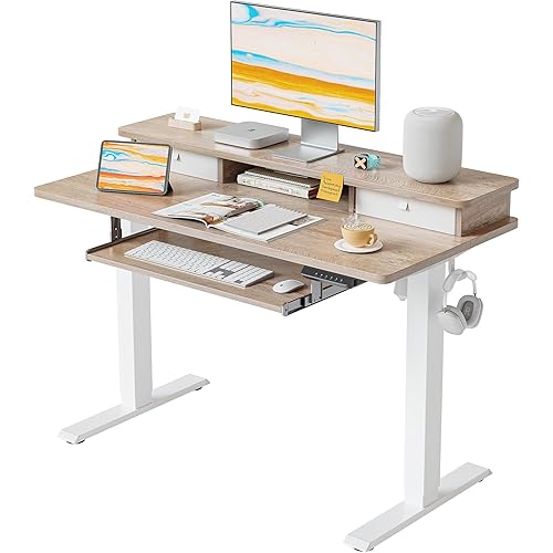 FEZIBO Height Adjustable Electric Standing Desk with Keyboard Tray, 48 x 24 Inch Stand Up Table with Storage Shelf, Sit Stand Desk, Maple Top