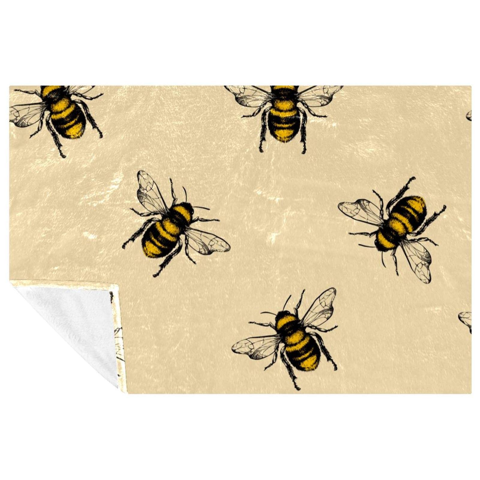 Couverture douce motif abeille pour des moments cocooning chaleureux