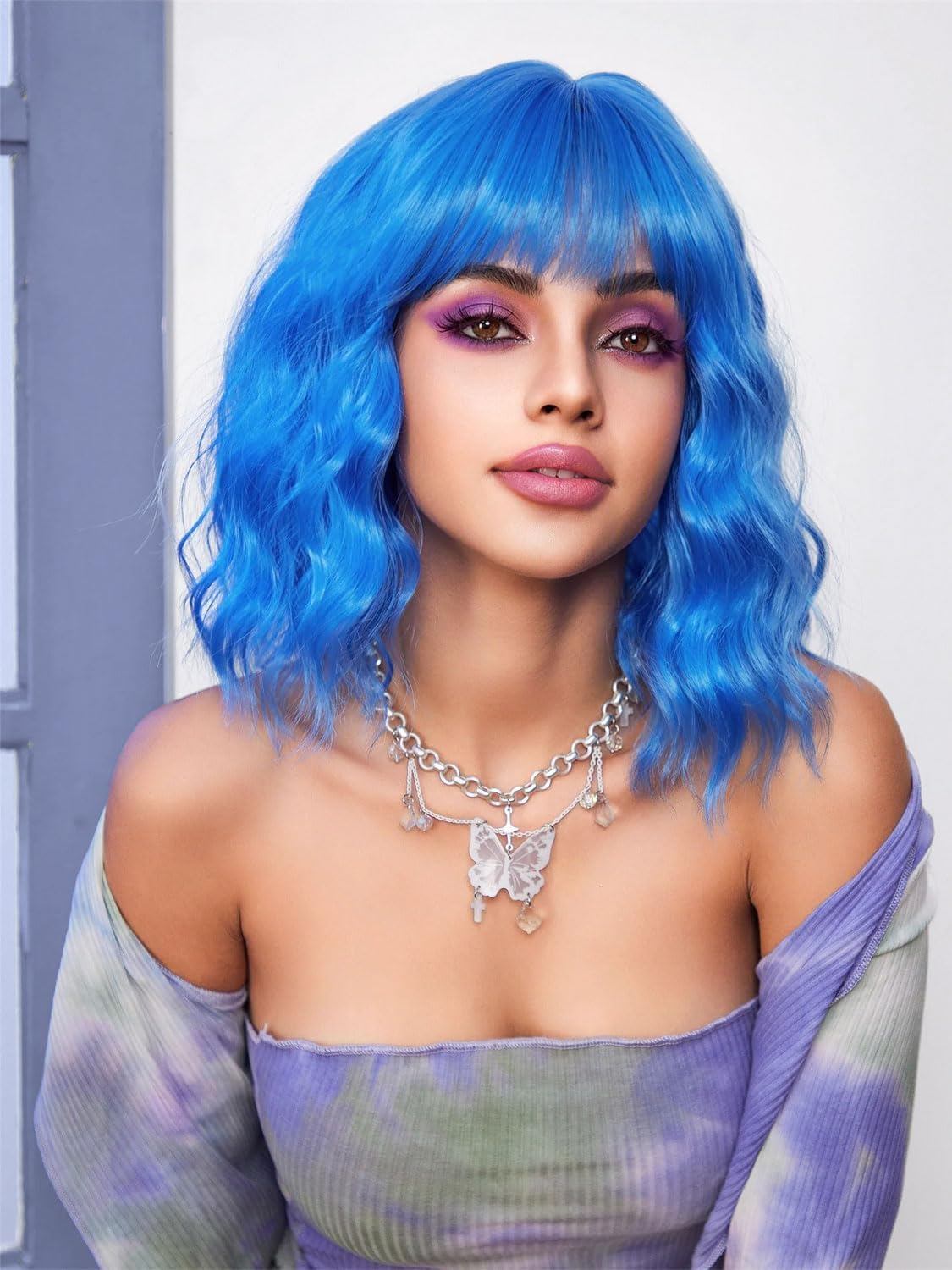 Colorfulpanda Short Bob Blue Wigs for Women Shoulder Length Wavy Curly Wig with Fringe Natural Synthetic Heat Resistant Hair Wig Daily Party wig 14 Inch