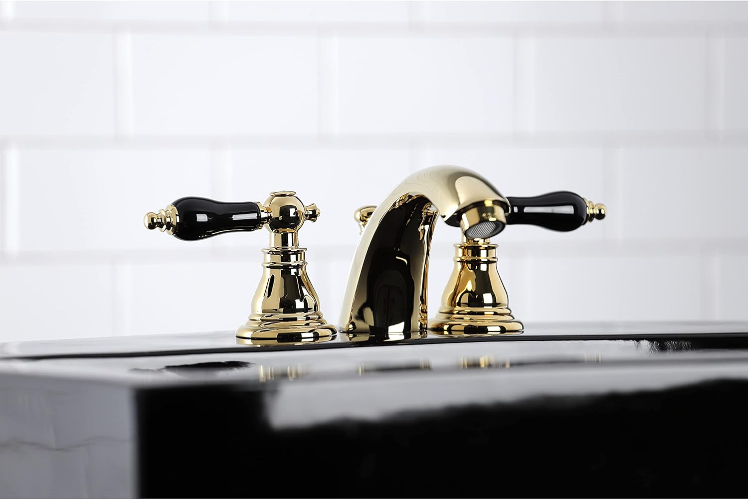 Kingston Brass KB952AKL Duchess Widespread Bathroom Faucet with Plastic Pop-Up, Polished Brass